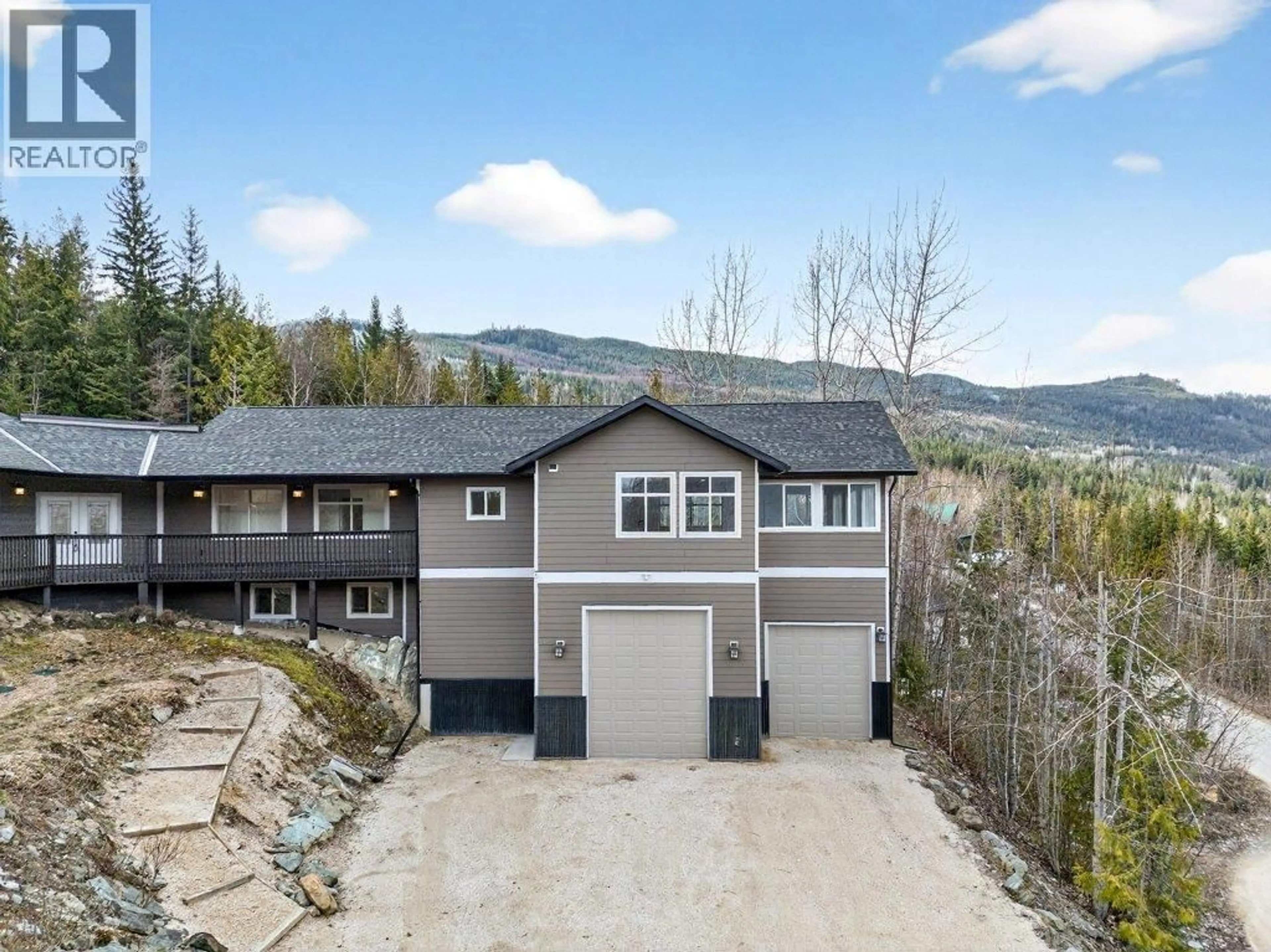 A pic from outside/outdoor area/front of a property/back of a property/a pic from drone, mountain view for 5058 HERITAGE DRIVE, Eagle Bay British Columbia V0E1T0