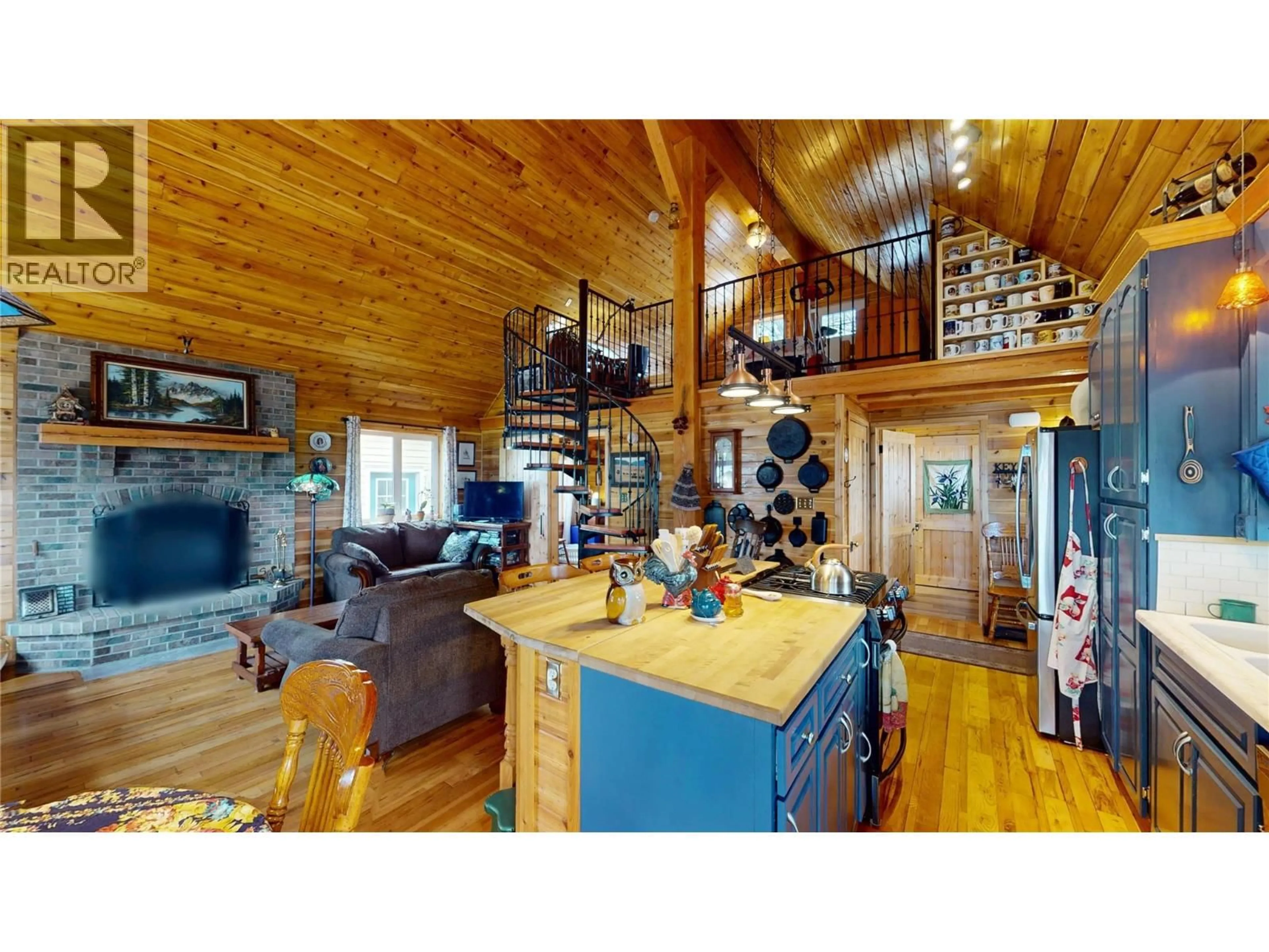 Open concept kitchen, wood/laminate floor for 2122 ERICKSON STREET, Creston British Columbia V0B1G5