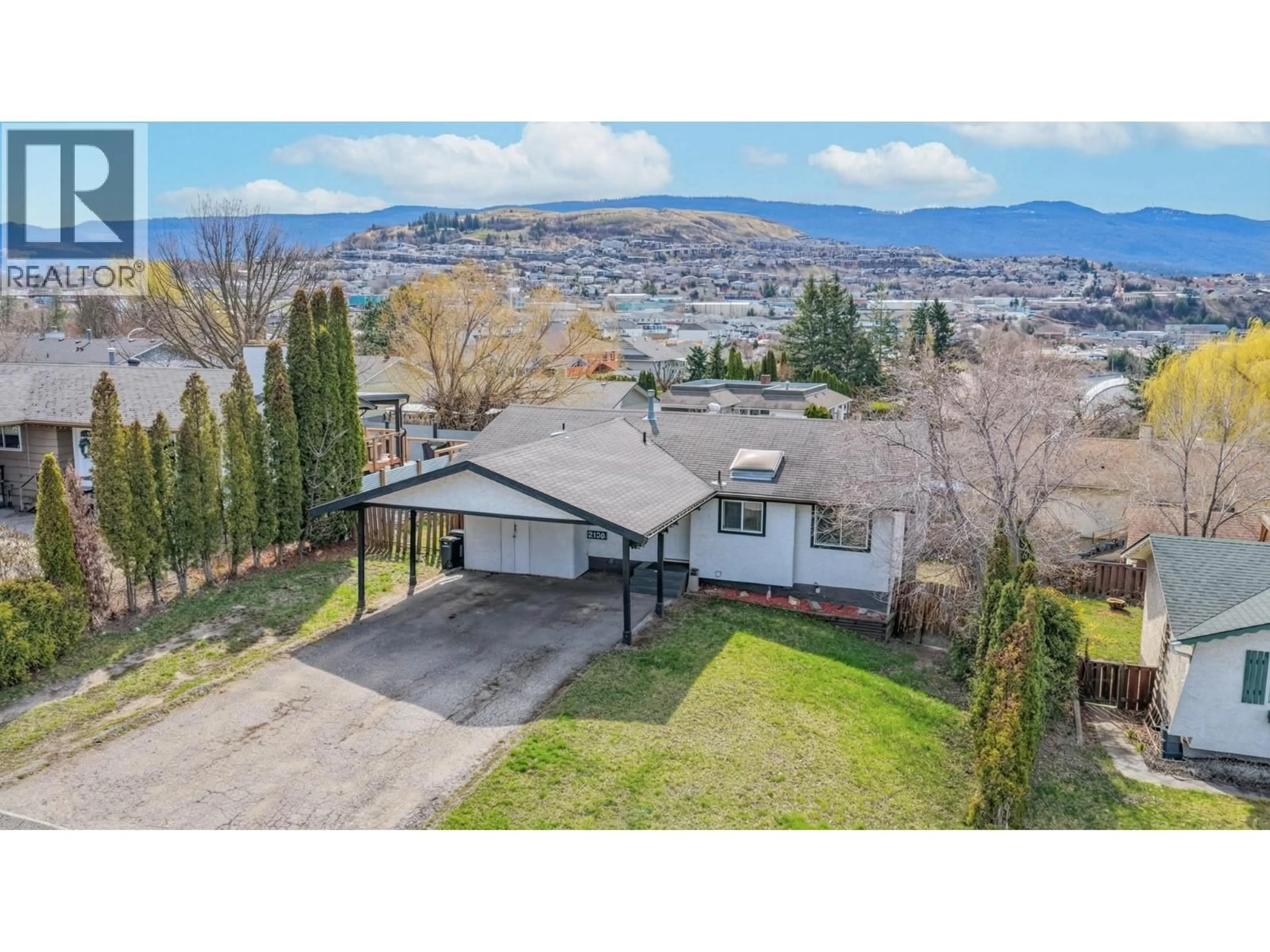 A pic from outside/outdoor area/front of a property/back of a property/a pic from drone, mountain view for 2104 20 AVENUE, Vernon British Columbia V1T7J6