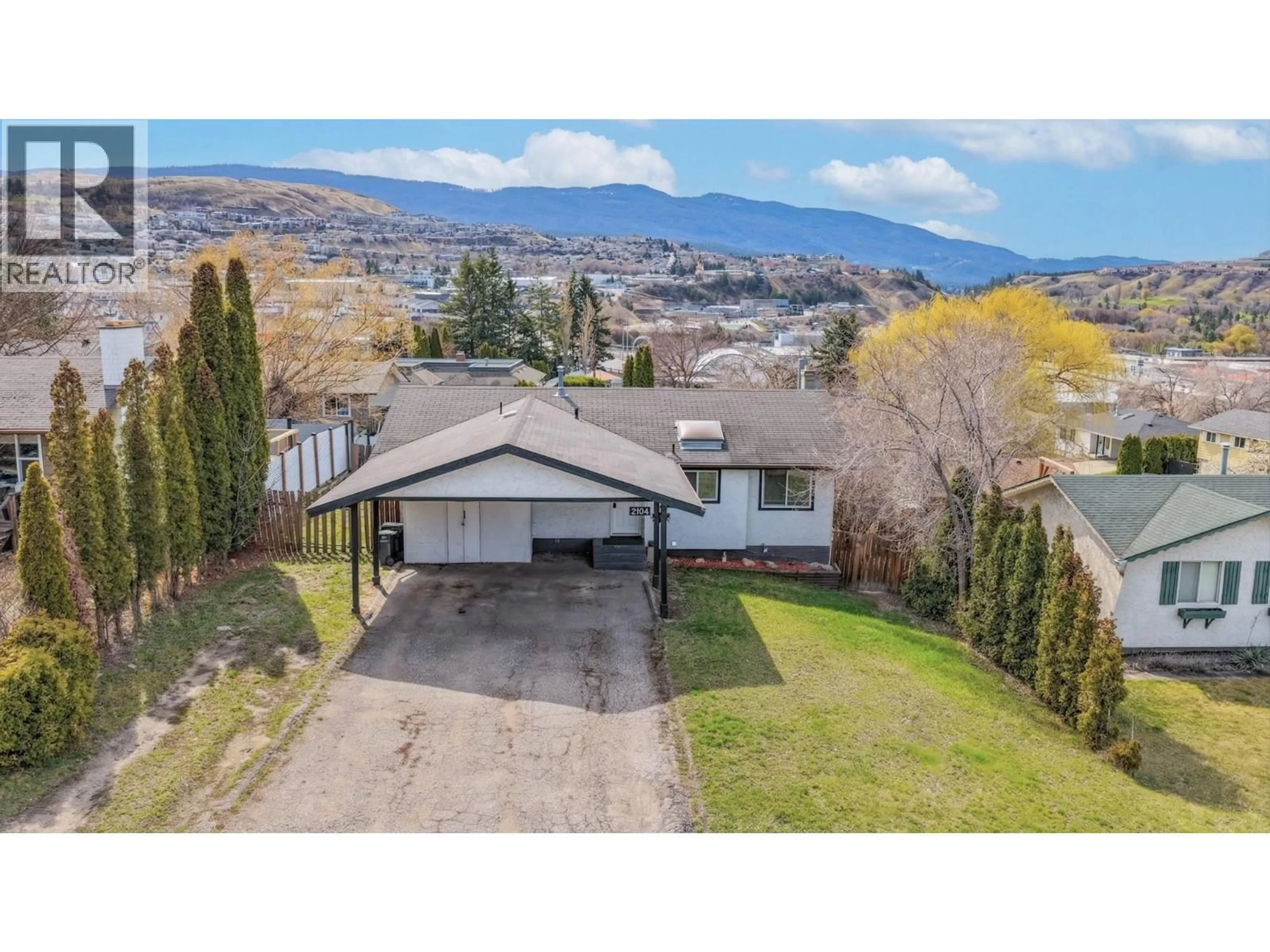 A pic from outside/outdoor area/front of a property/back of a property/a pic from drone, mountain view for 2104 20 AVENUE, Vernon British Columbia V1T7J6
