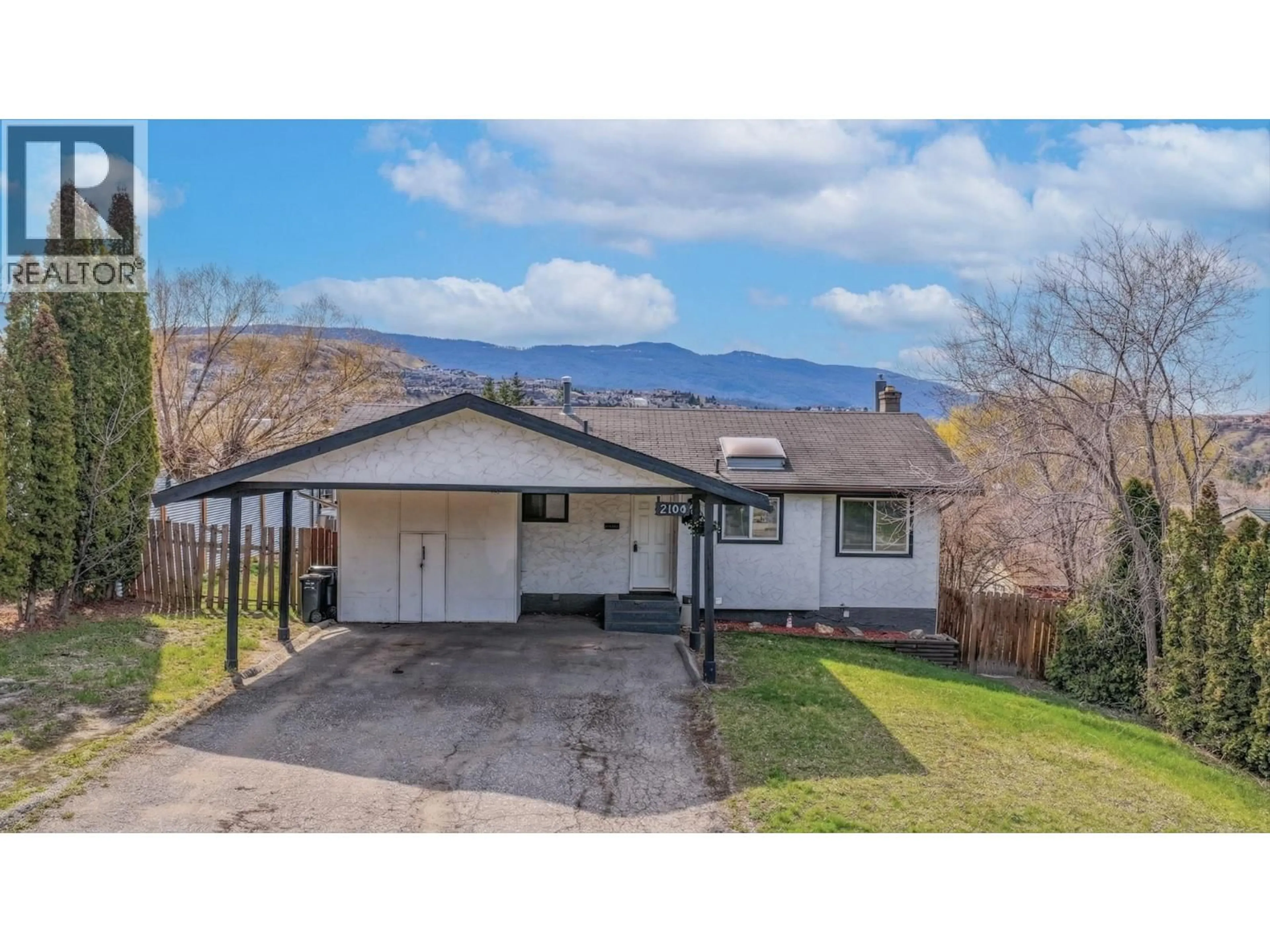 A pic from outside/outdoor area/front of a property/back of a property/a pic from drone, mountain view for 2104 20 AVENUE, Vernon British Columbia V1T7J6