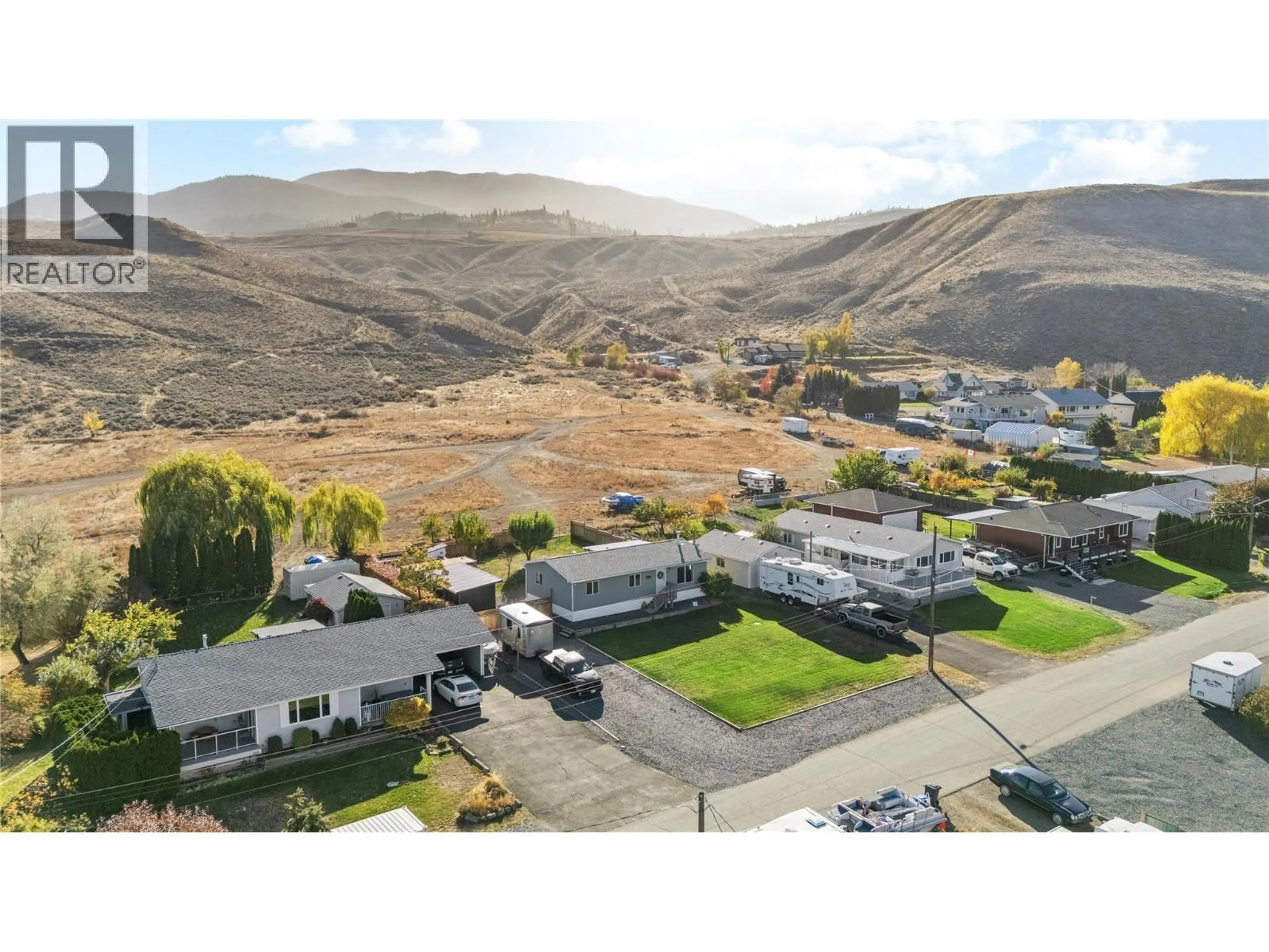 A pic from outside/outdoor area/front of a property/back of a property/a pic from drone, mountain view for 7020 WATSON DRIVE EAST, Kamloops British Columbia V0K2J0