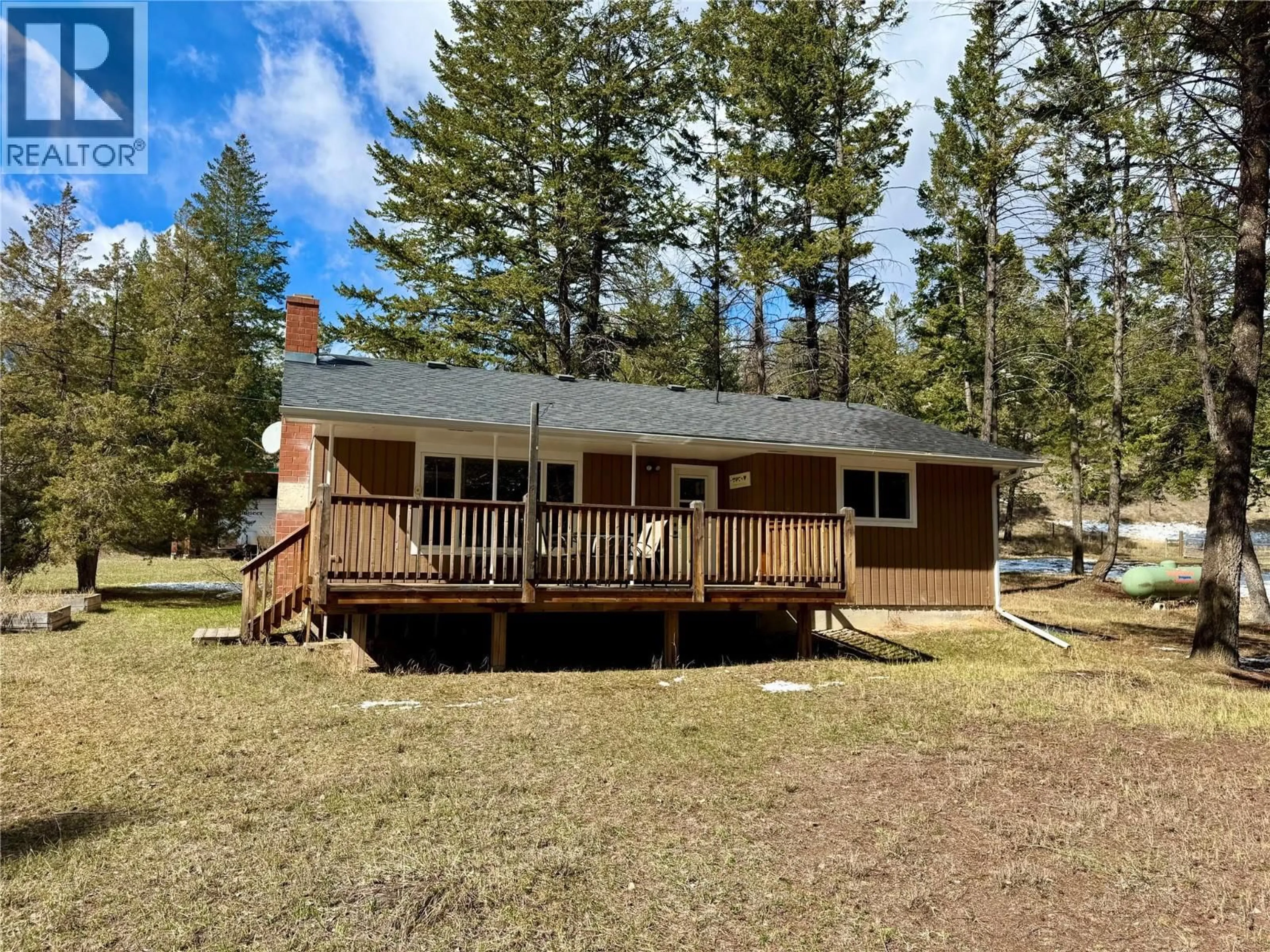 A pic from outside/outdoor area/front of a property/back of a property/a pic from drone, water/lake/river/ocean view for 8279 SUN CREEK ROAD OTHER, Canal Flats British Columbia V0B1B0