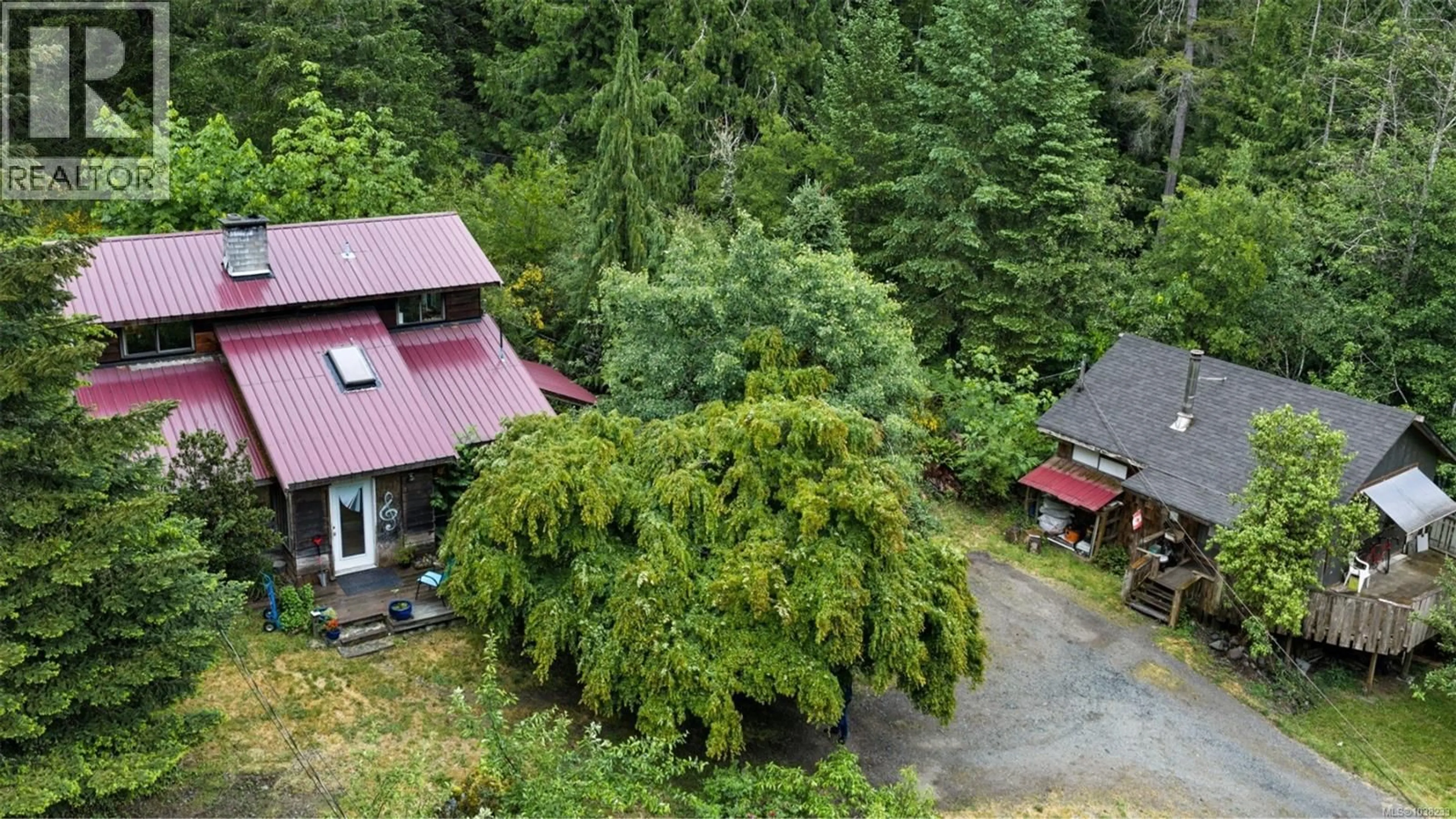 A pic from outside/outdoor area/front of a property/back of a property/a pic from drone, forest/trees view for 1865 OLDHAM ROAD, Shawnigan Lake British Columbia V8H0B4