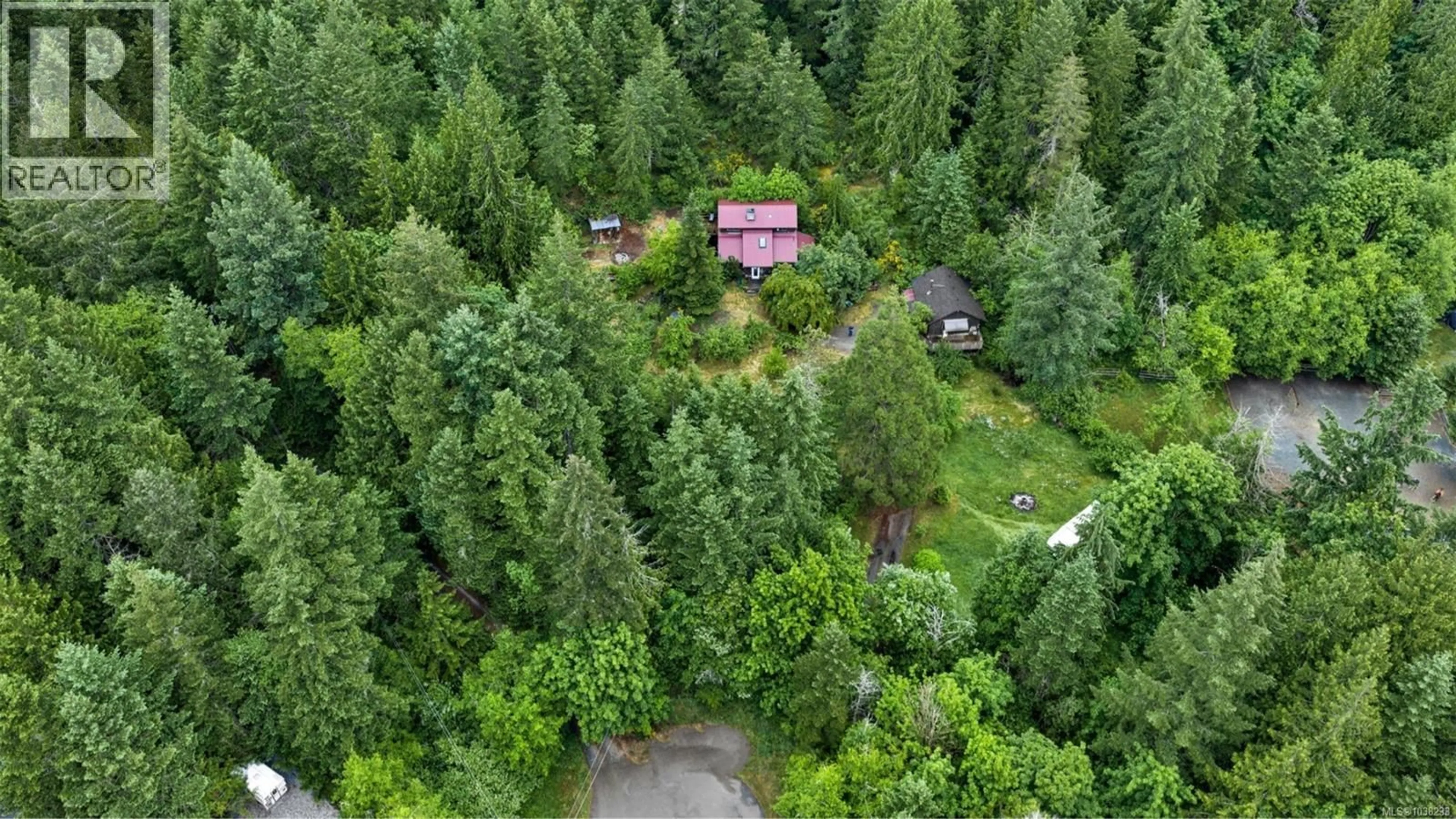 A pic from outside/outdoor area/front of a property/back of a property/a pic from drone, forest/trees view for 1865 OLDHAM ROAD, Shawnigan Lake British Columbia V8H0B4