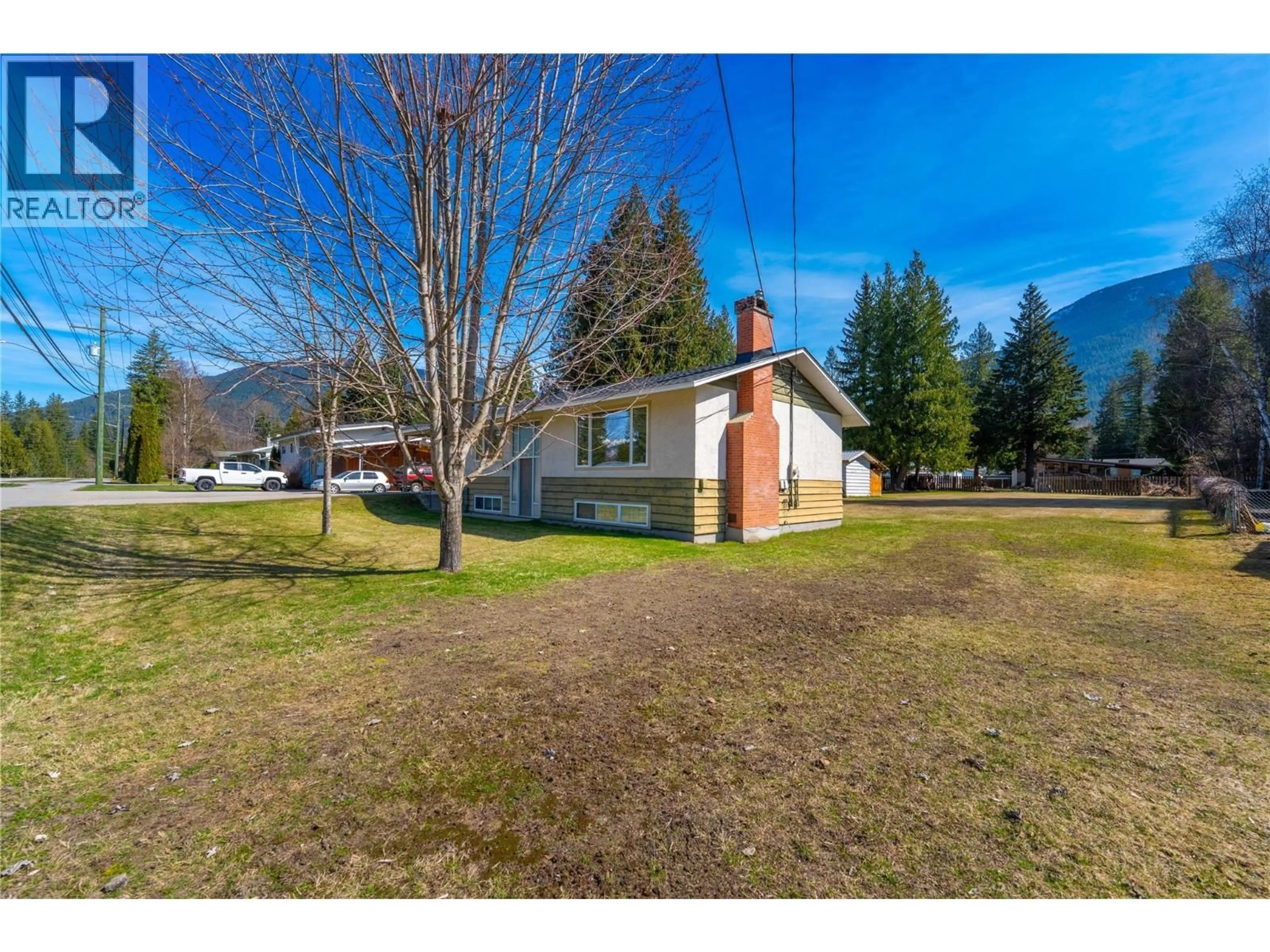 A pic from outside/outdoor area/front of a property/back of a property/a pic from drone, unknown for 1956 AIRPORT WAY, Revelstoke British Columbia V0E2S1