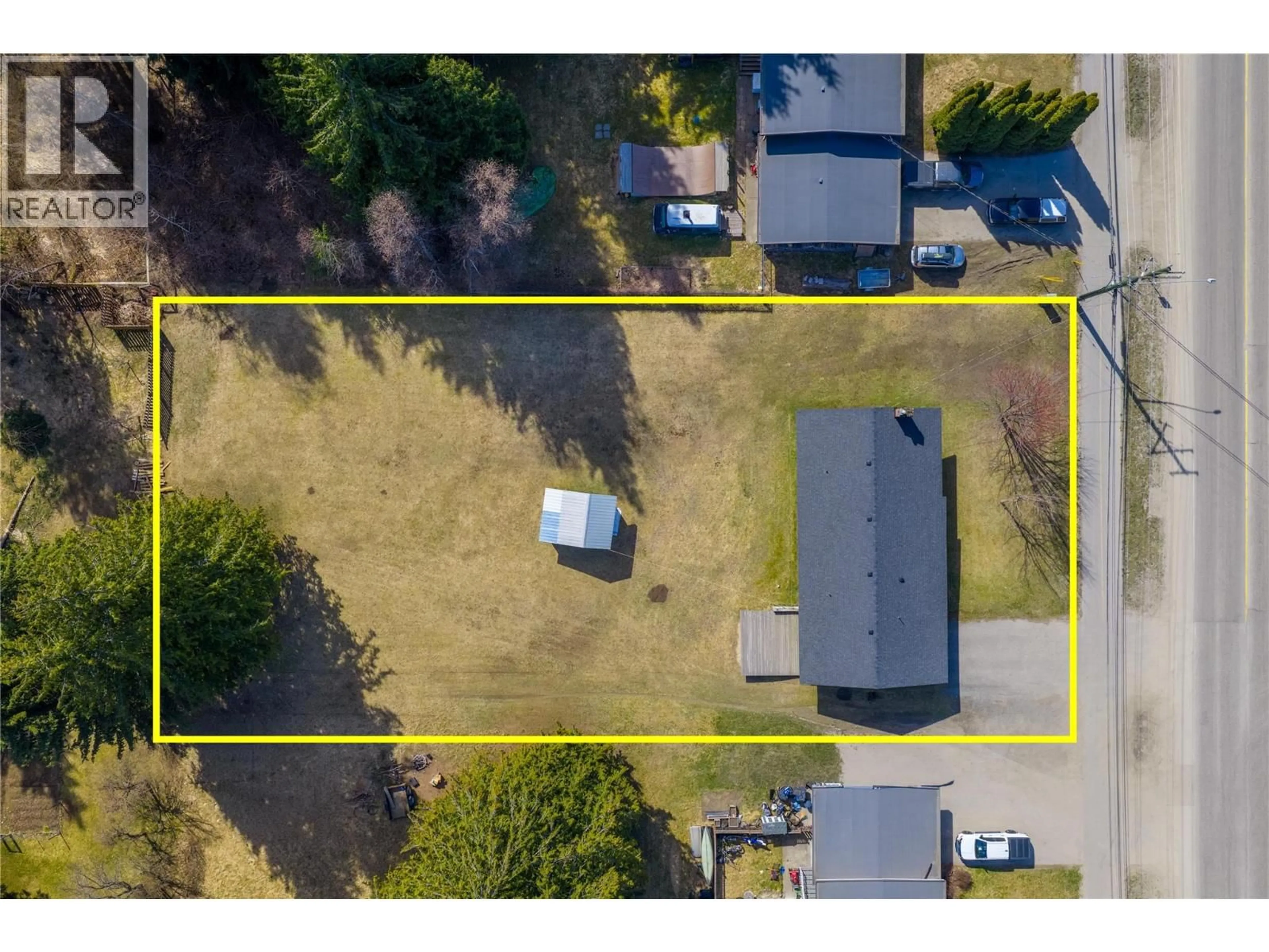 A pic from outside/outdoor area/front of a property/back of a property/a pic from drone, street for 1956 AIRPORT WAY, Revelstoke British Columbia V0E2S1