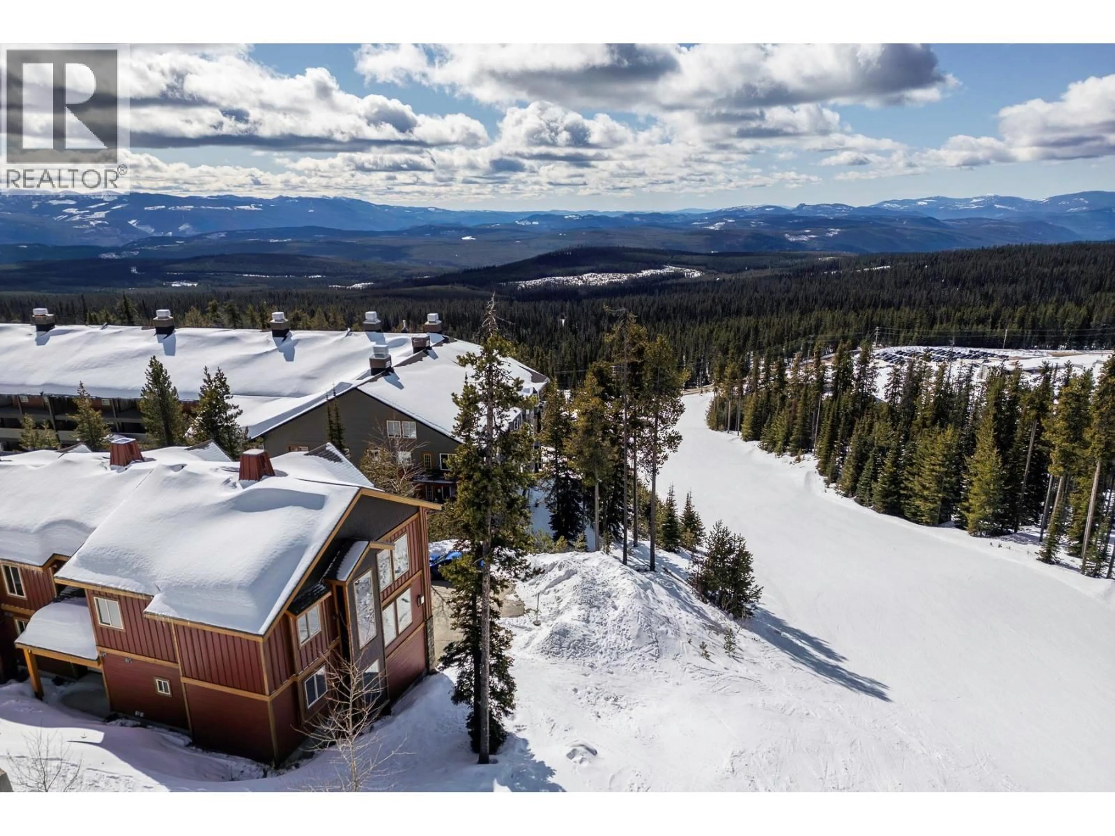 A pic from outside/outdoor area/front of a property/back of a property/a pic from drone, mountain view for 1 - 229 KETTLE VIEW ROAD, Big White British Columbia V1P1T4
