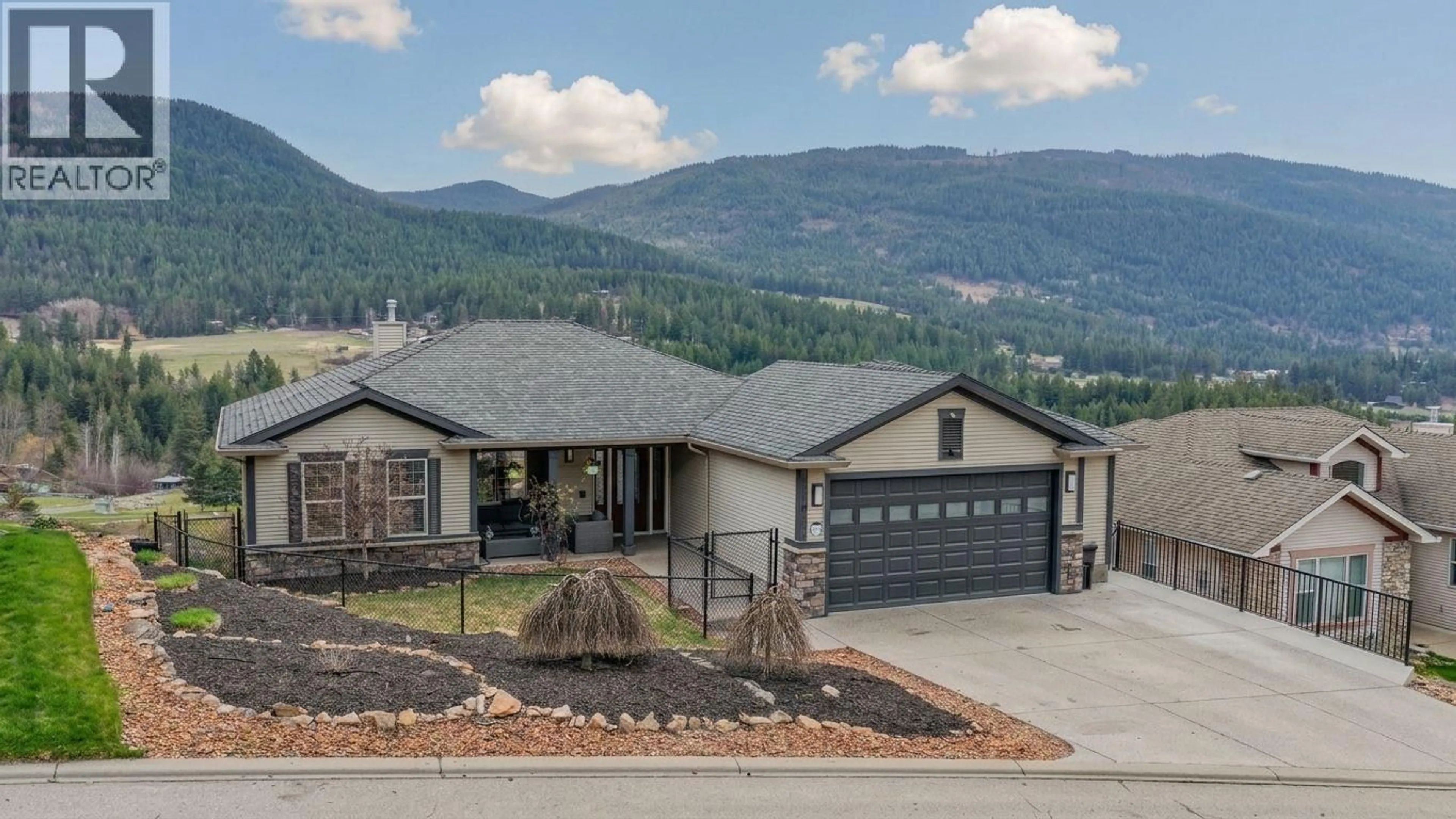 Home with vinyl exterior material, mountain view for 7104 NAKISKA DRIVE, Vernon British Columbia V1B3M5
