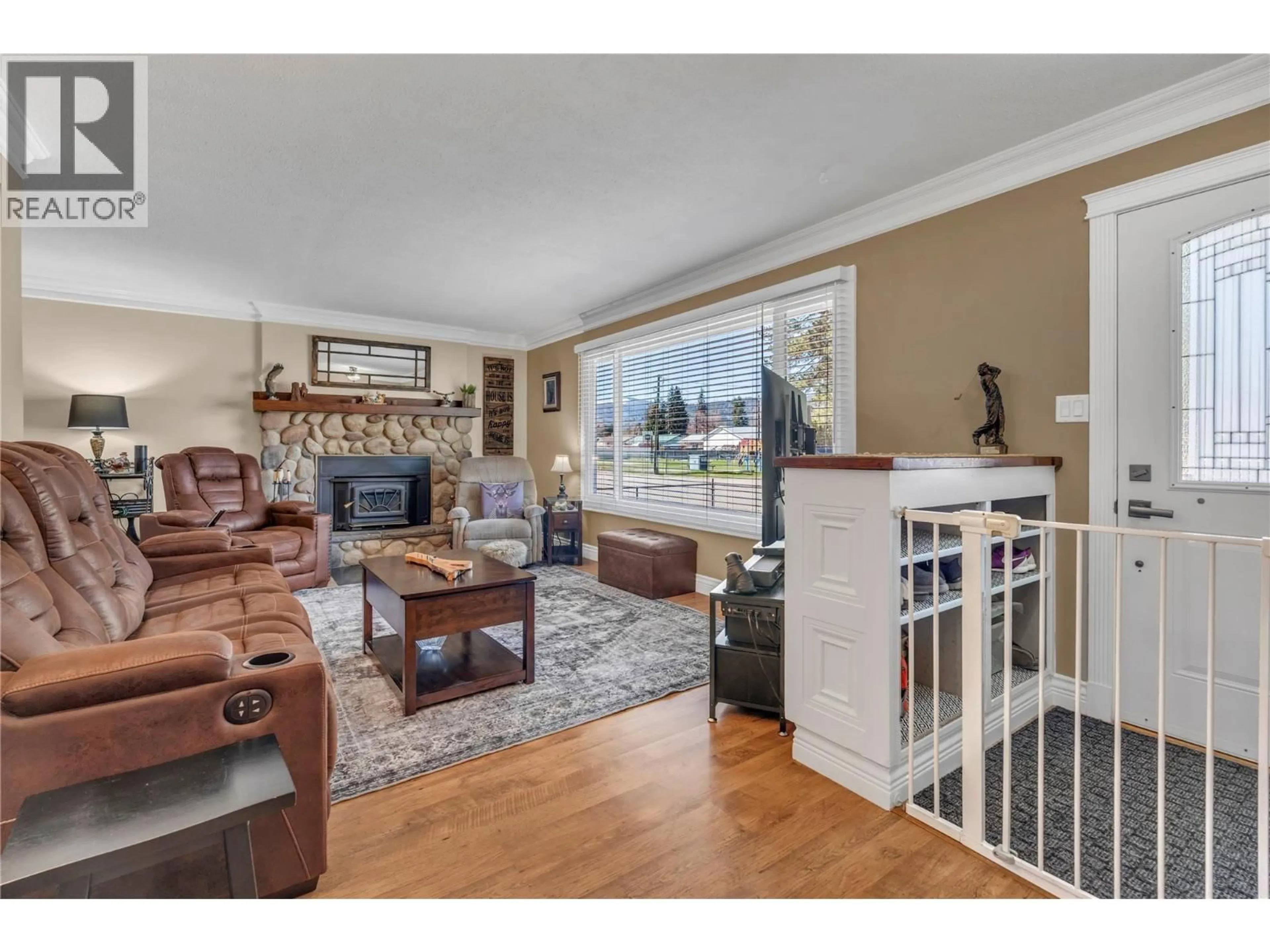 Living room with furniture, wood/laminate floor for 402 BILLITER AVENUE, Princeton British Columbia V0X1W0