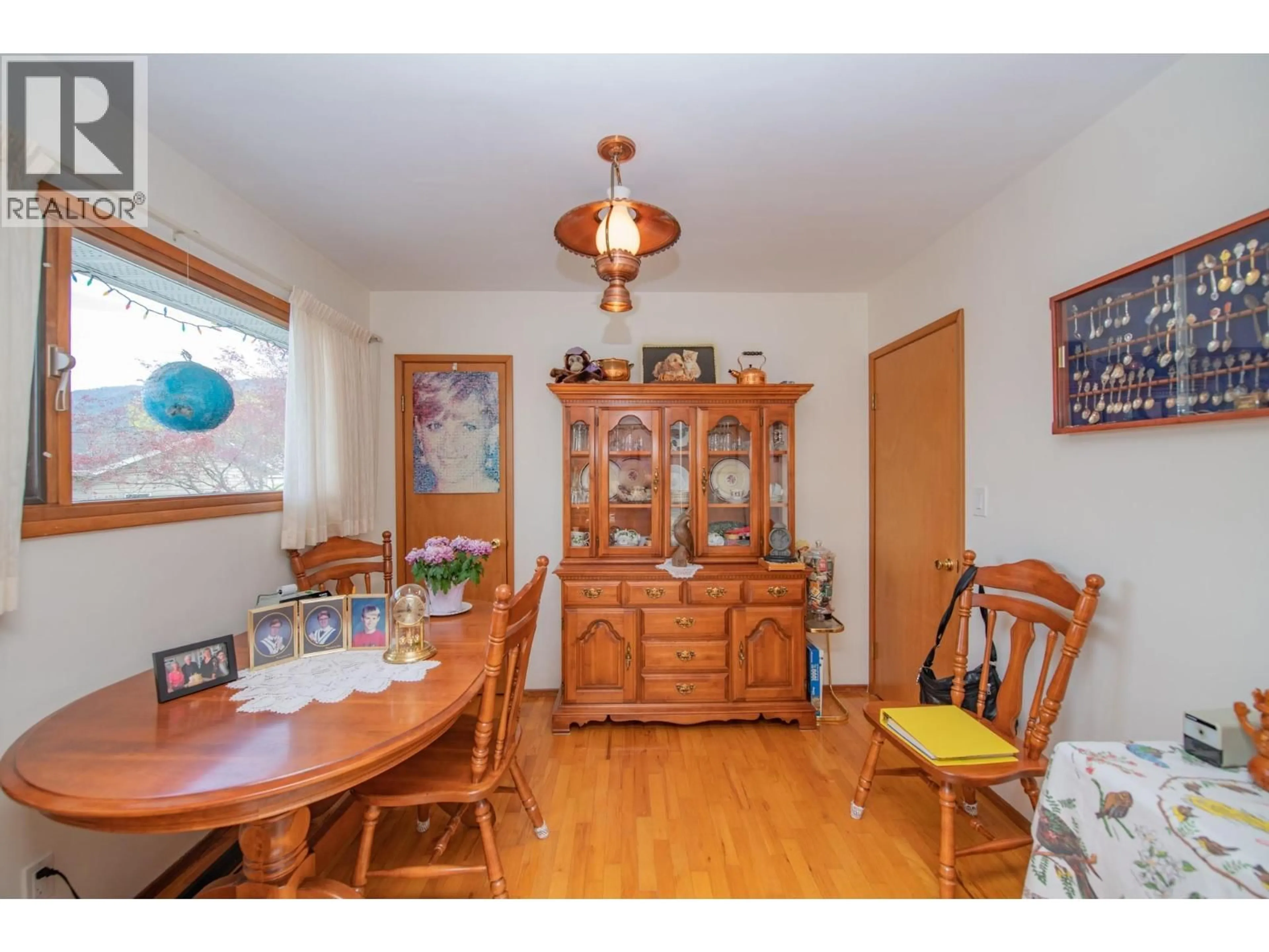 Dining room, wood/laminate floor for 2007 29 CRESCENT, Vernon British Columbia V1T1Y6