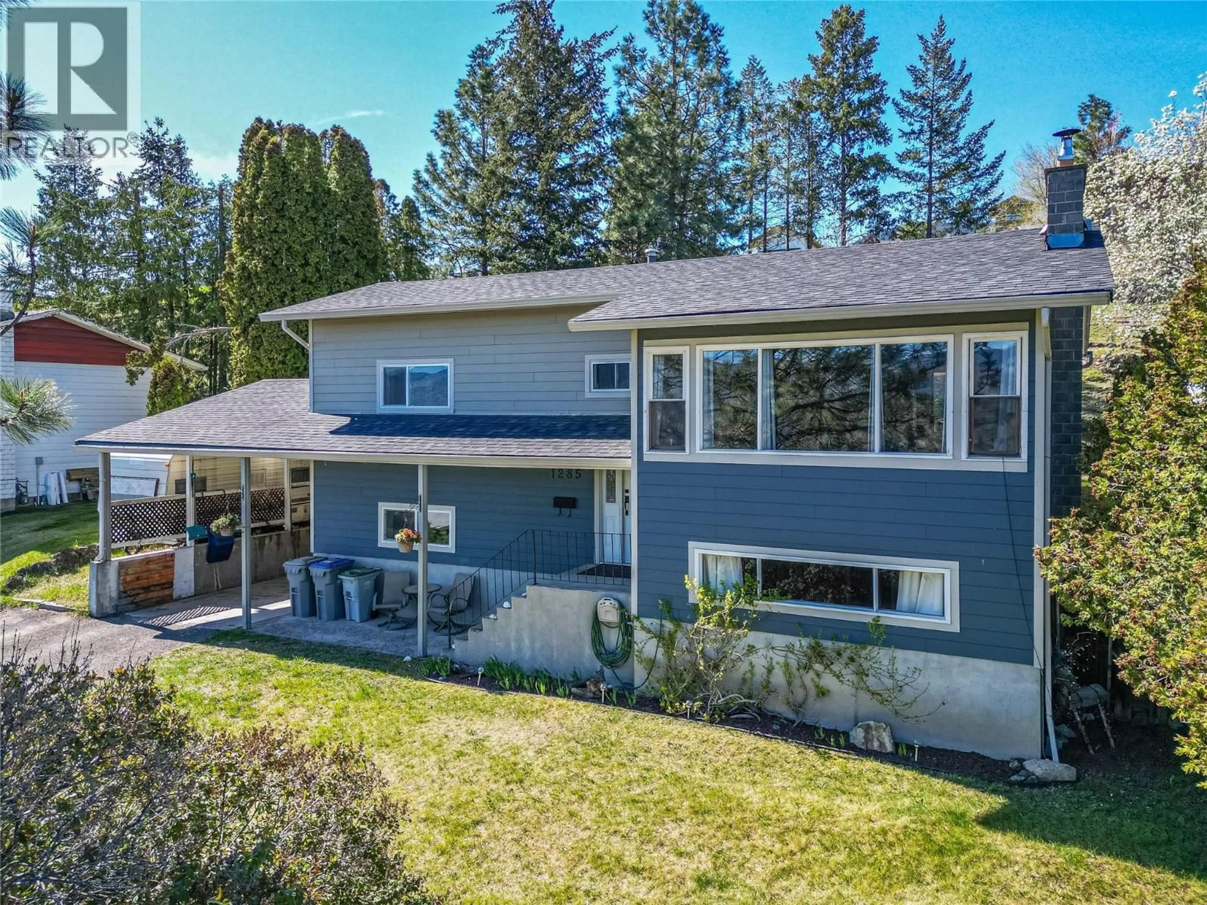 A pic from outside/outdoor area/front of a property/back of a property/a pic from drone, mountain view for 1285 BELAIR DRIVE, Kamloops British Columbia V2C5G3