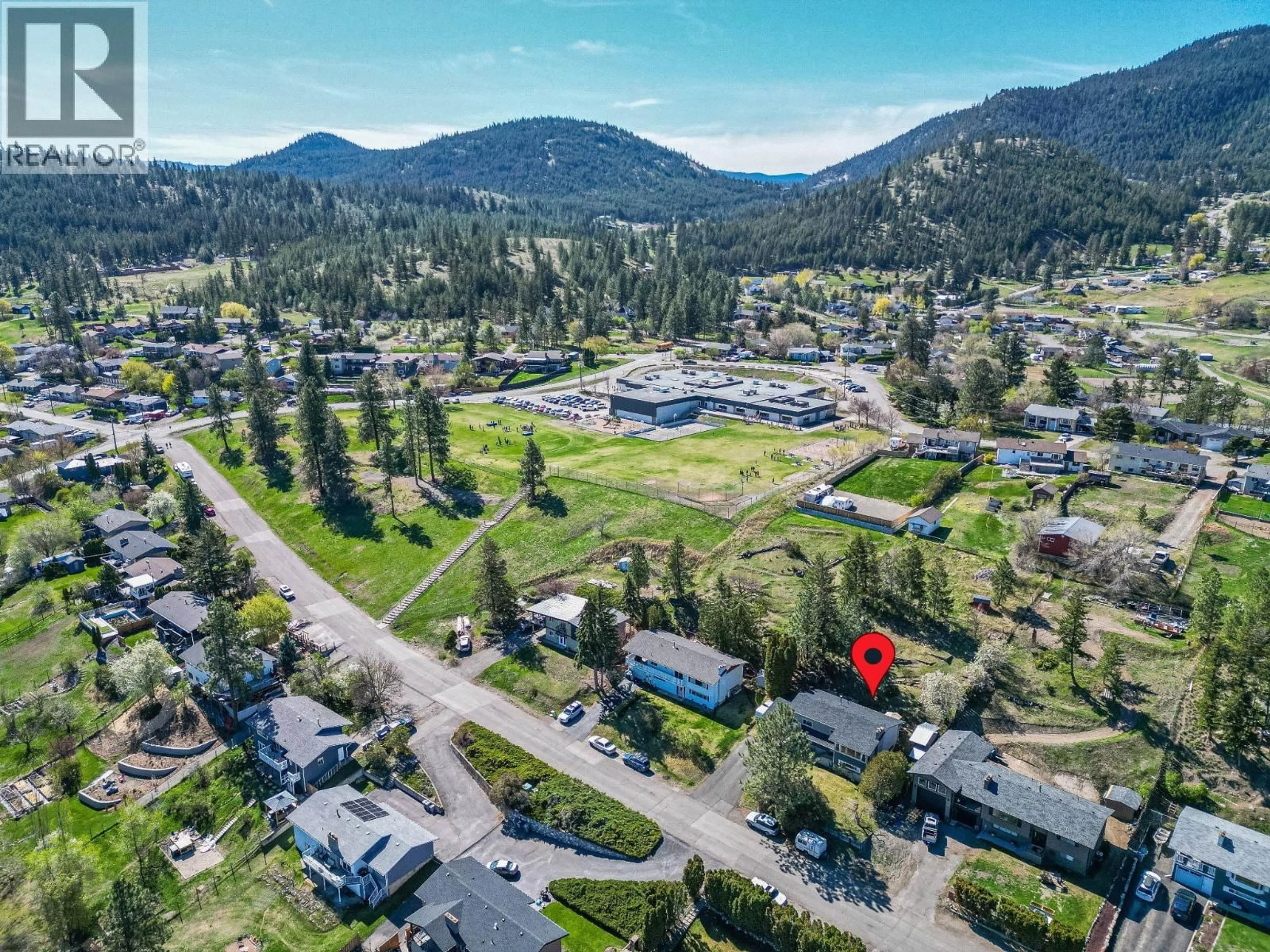 A pic from outside/outdoor area/front of a property/back of a property/a pic from drone, mountain view for 1285 BELAIR DRIVE, Kamloops British Columbia V2C5G3