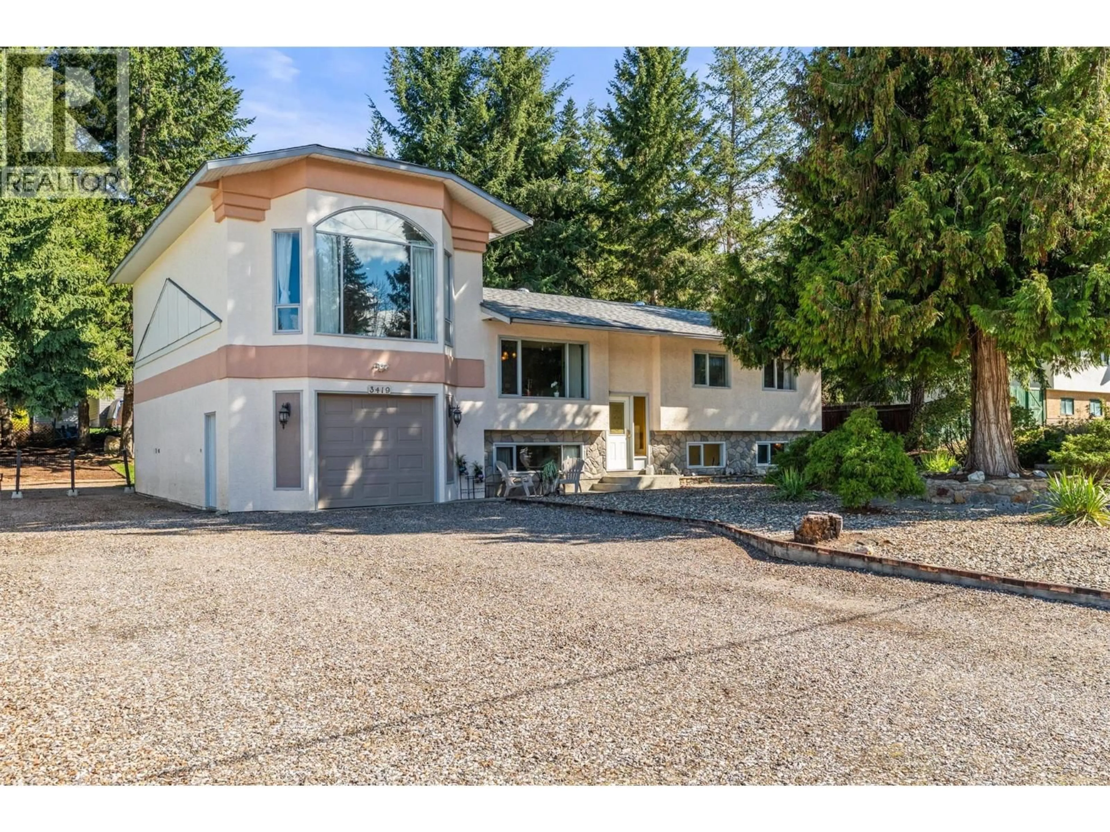 Home with vinyl exterior material, street for 3419 LARCH DRIVE, Armstrong British Columbia V4Y0S8