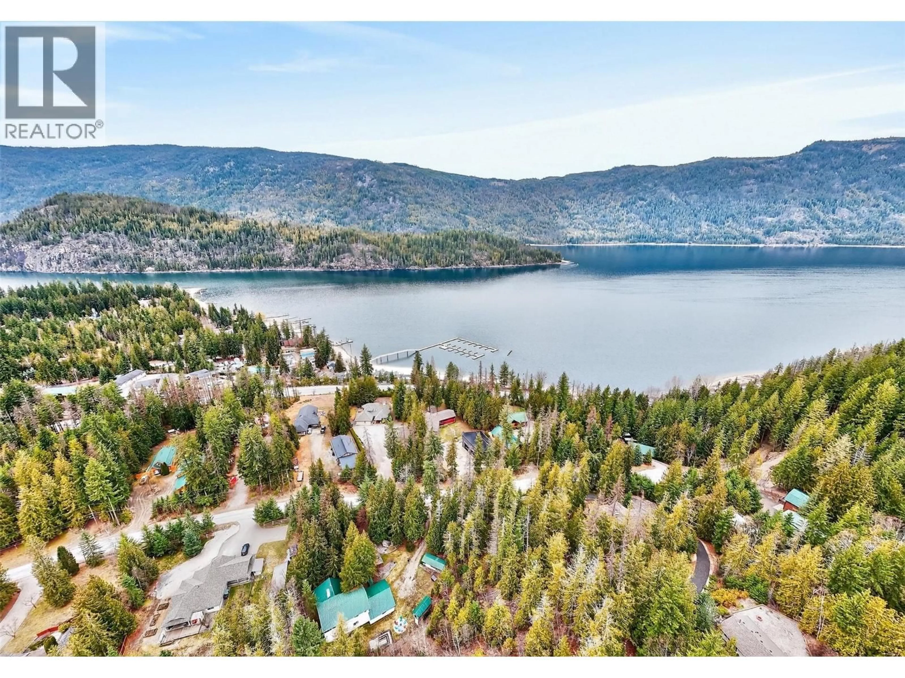 A pic from outside/outdoor area/front of a property/back of a property/a pic from drone, water/lake/river/ocean view for 9048 HUMMING BIRD DRIVE, Swansea Point British Columbia V0E2K2