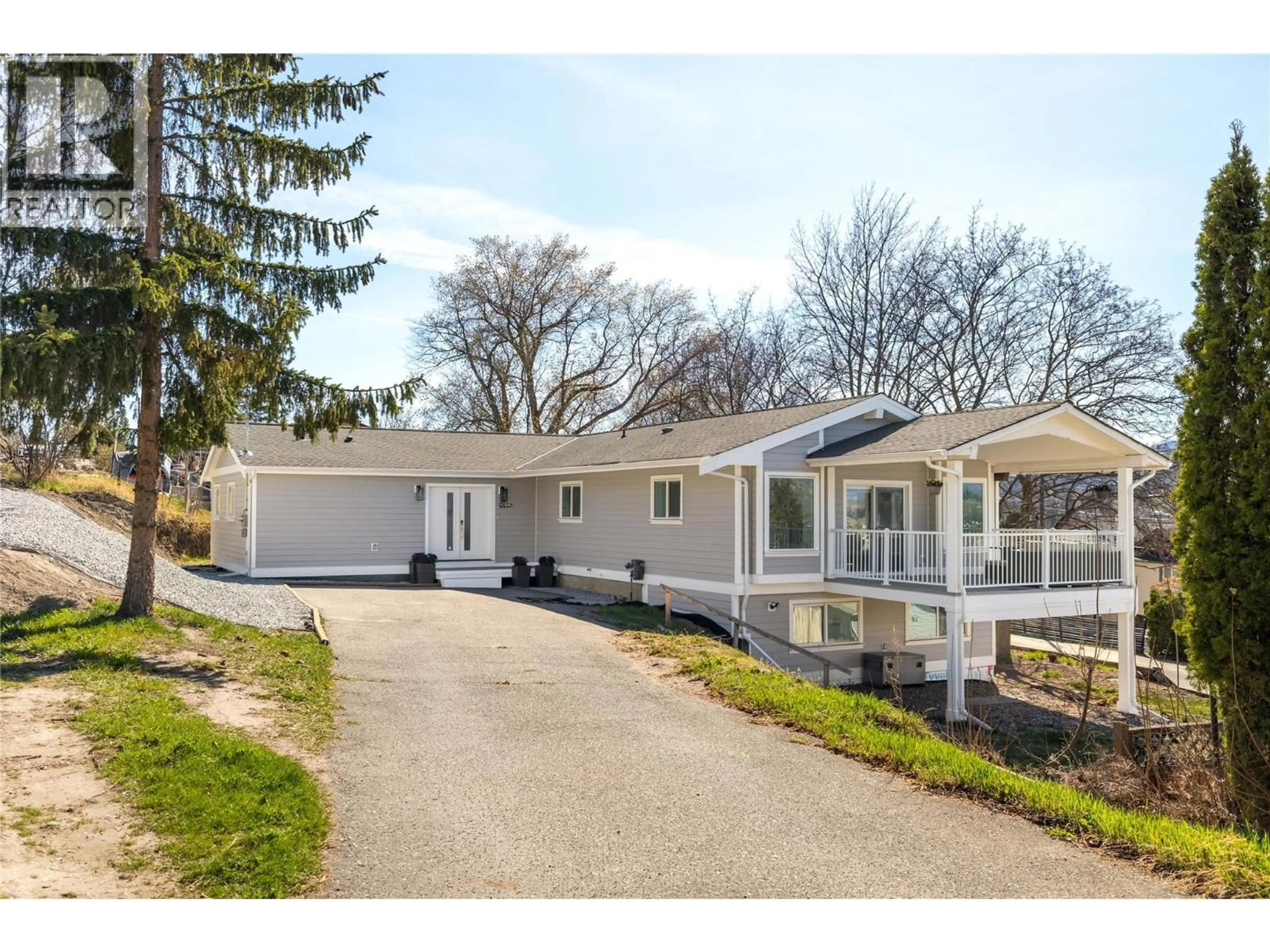 Home with vinyl exterior material, street for 10942 RUSSELL ROAD, Lake Country British Columbia V4V1W9