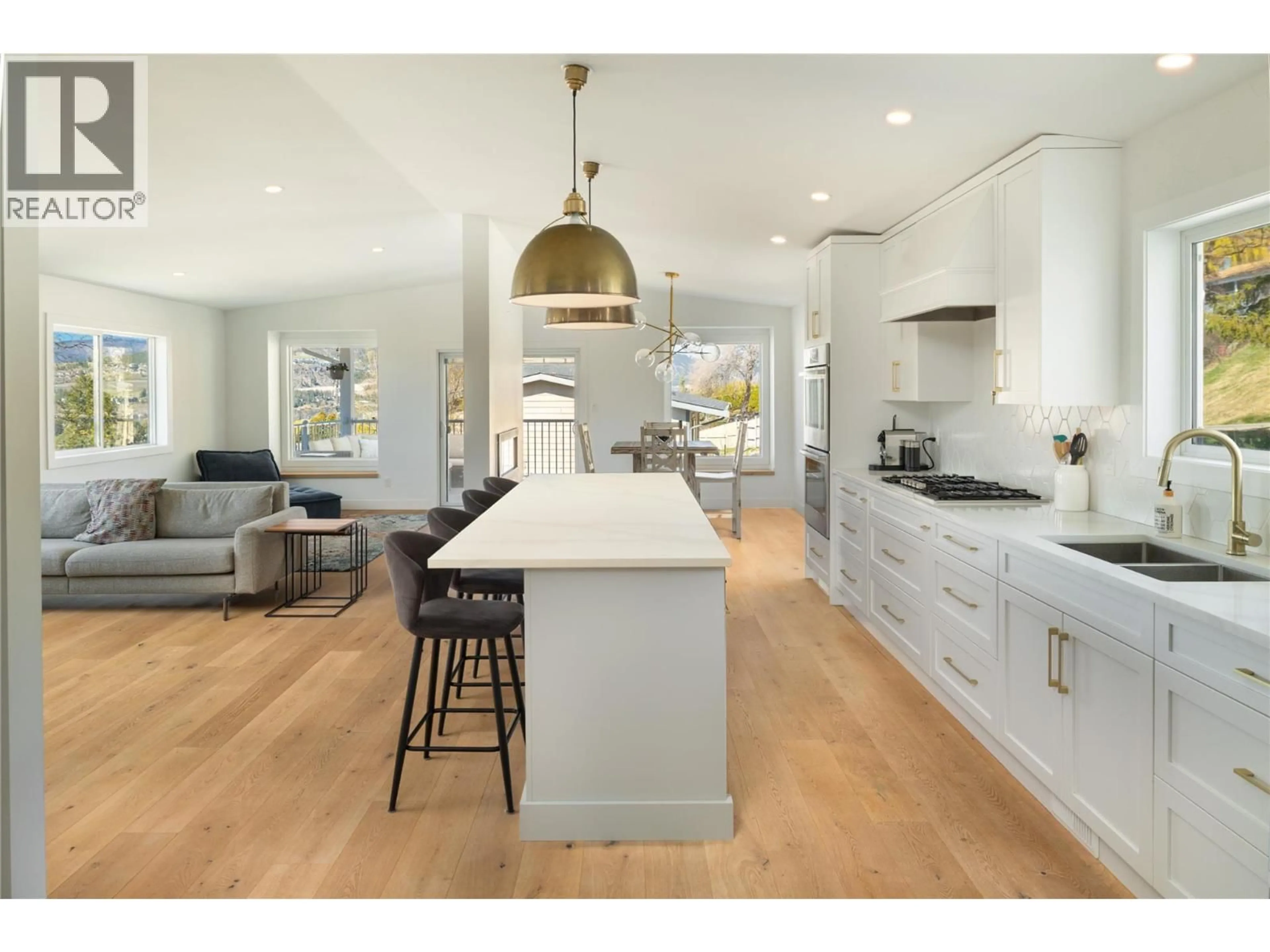 Open concept kitchen, wood/laminate floor for 10942 RUSSELL ROAD, Lake Country British Columbia V4V1W9