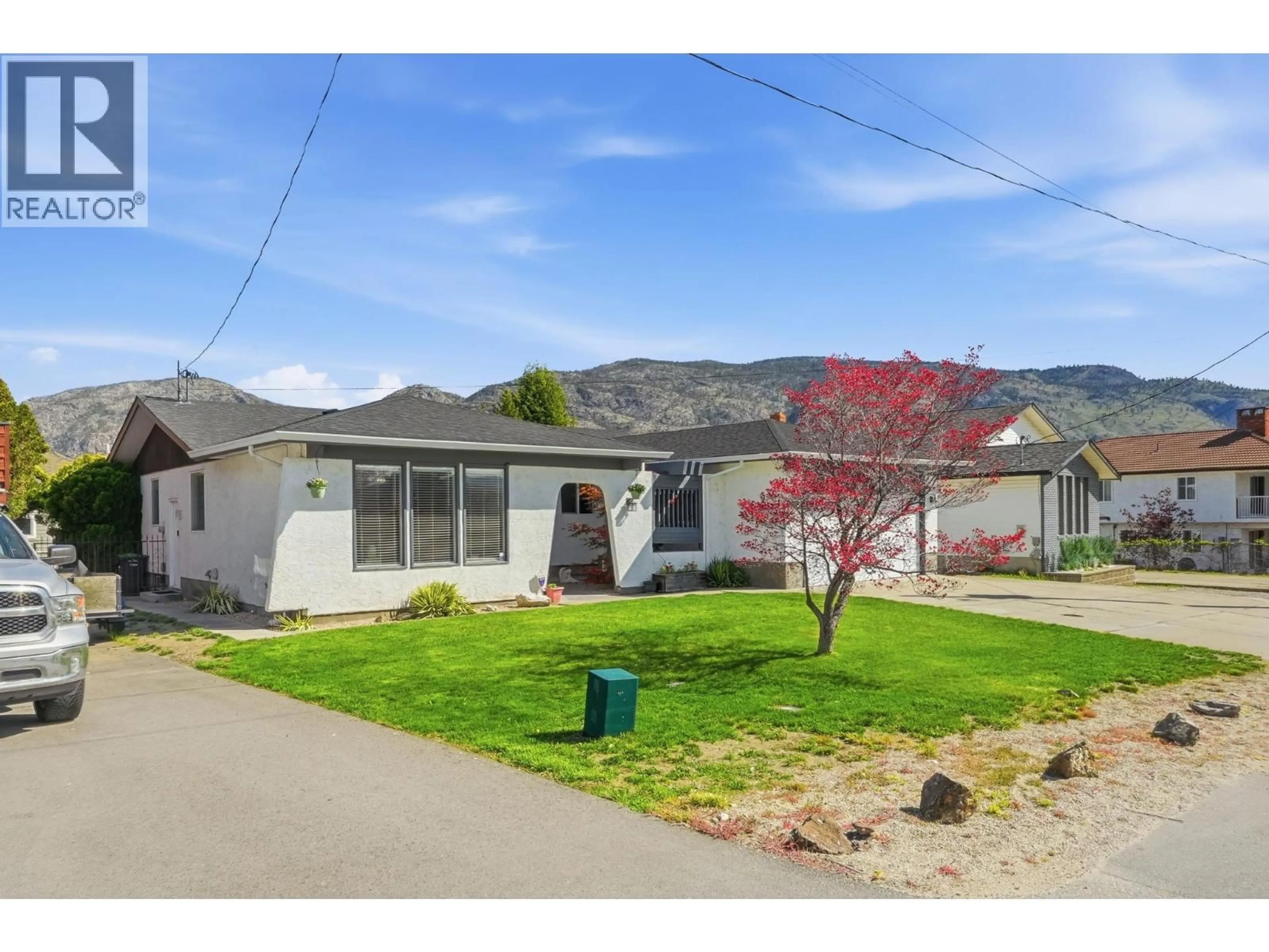 Home with vinyl exterior material, street for 9506 HUMMINGBIRD LANE, Osoyoos British Columbia V0H1V5