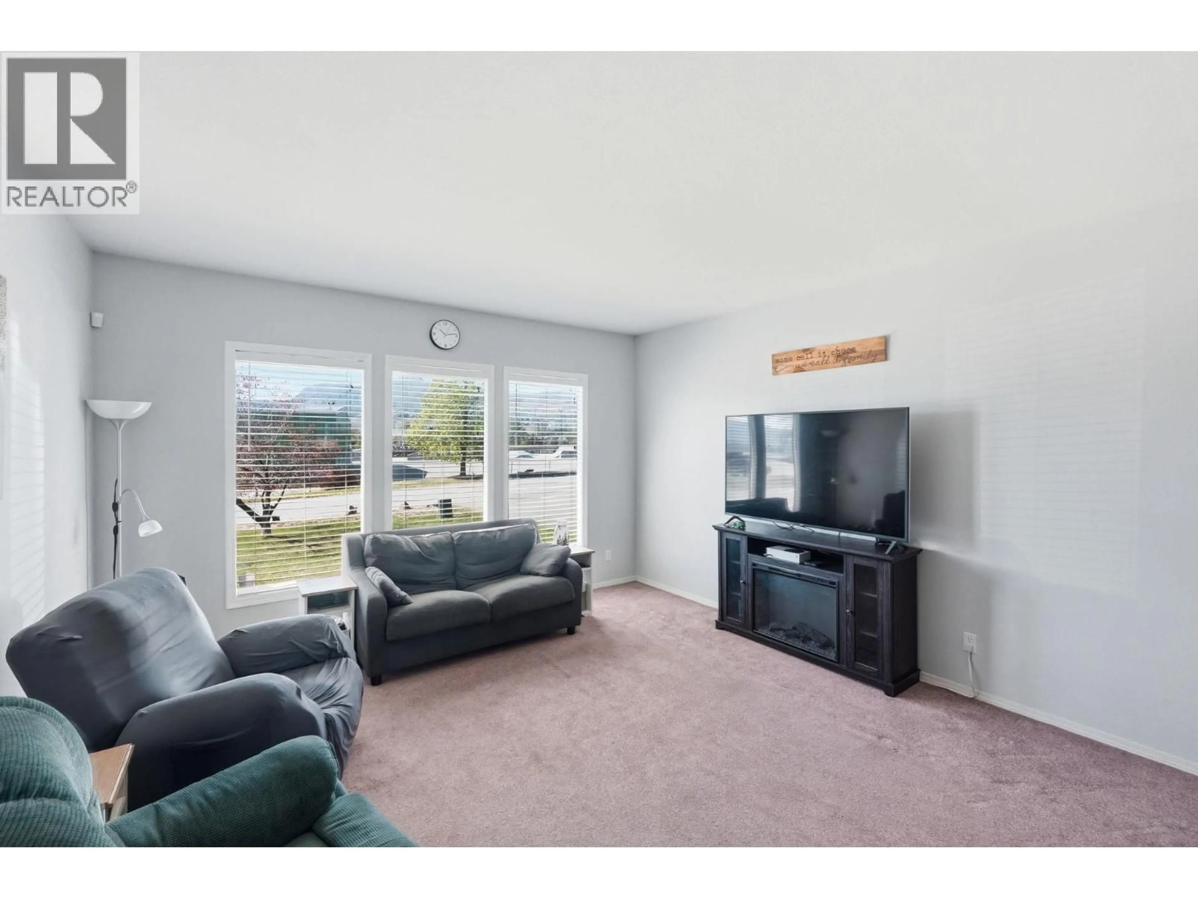 Living room with furniture, unknown for 9506 HUMMINGBIRD LANE, Osoyoos British Columbia V0H1V5