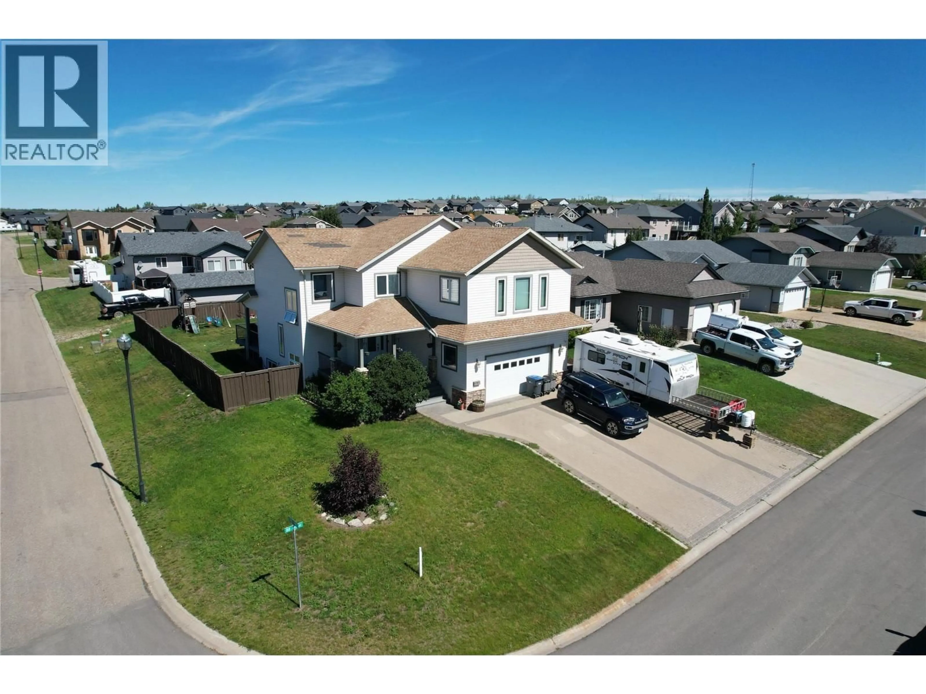 A pic from outside/outdoor area/front of a property/back of a property/a pic from drone, water/lake/river/ocean view for 1844 88 AVENUE, Dawson Creek British Columbia V1G0A6