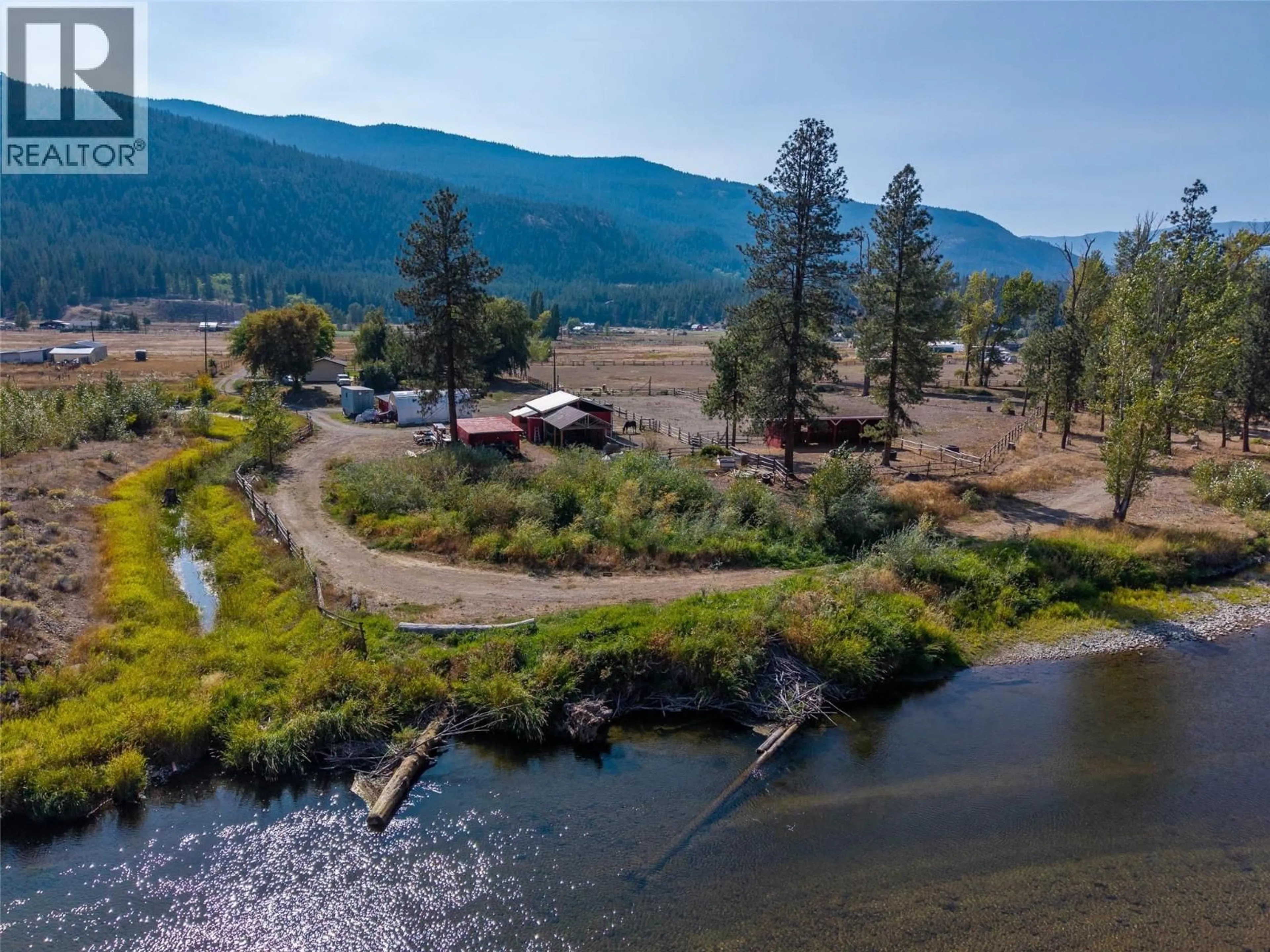 A pic from outside/outdoor area/front of a property/back of a property/a pic from drone, water/lake/river/ocean view for 1815 NICOLLS ROAD, Merritt British Columbia V1K1N7