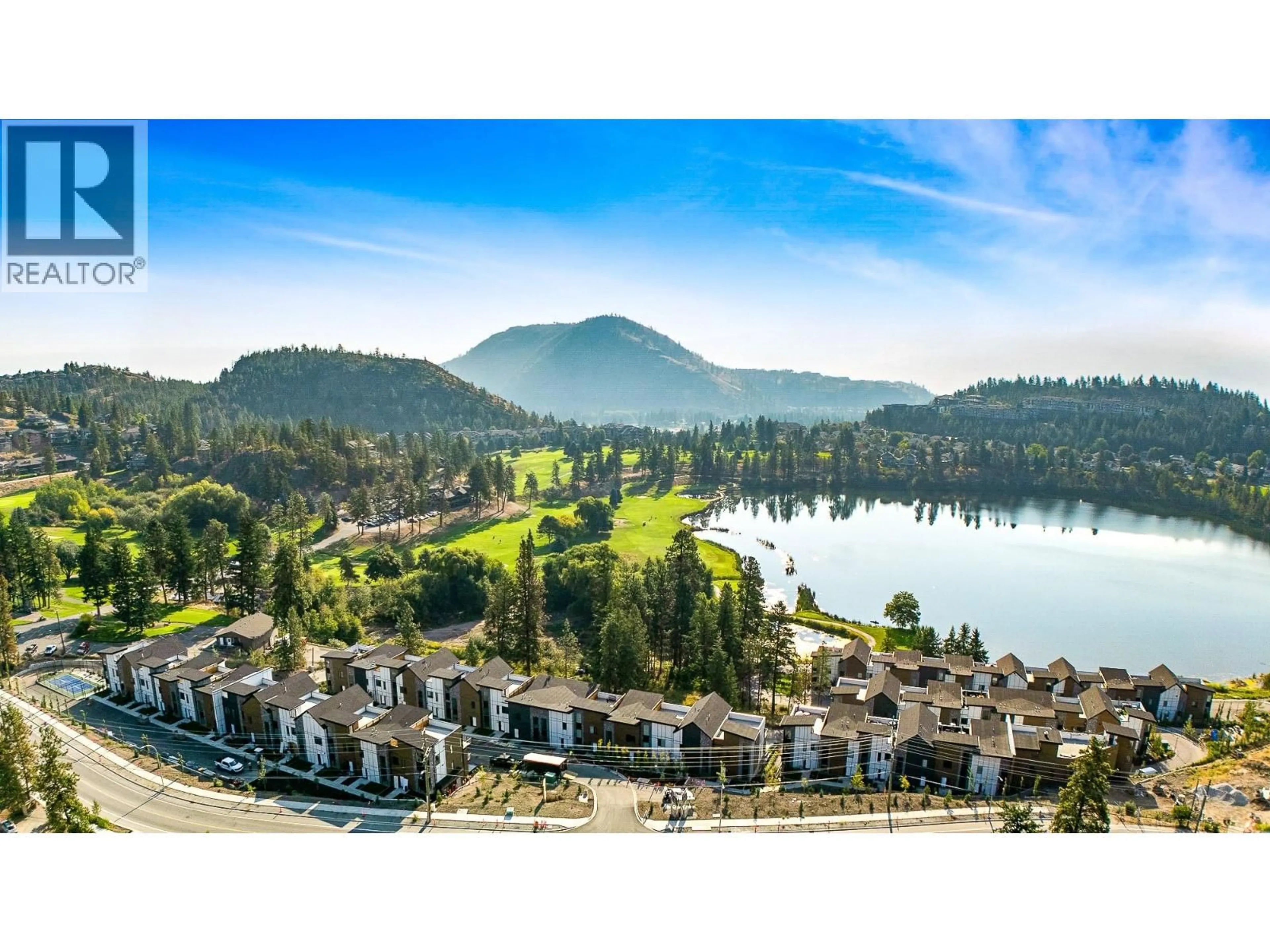 A pic from outside/outdoor area/front of a property/back of a property/a pic from drone, water/lake/river/ocean view for 411 - 2735 SHANNON LAKE ROAD, West Kelowna British Columbia V4T1V6