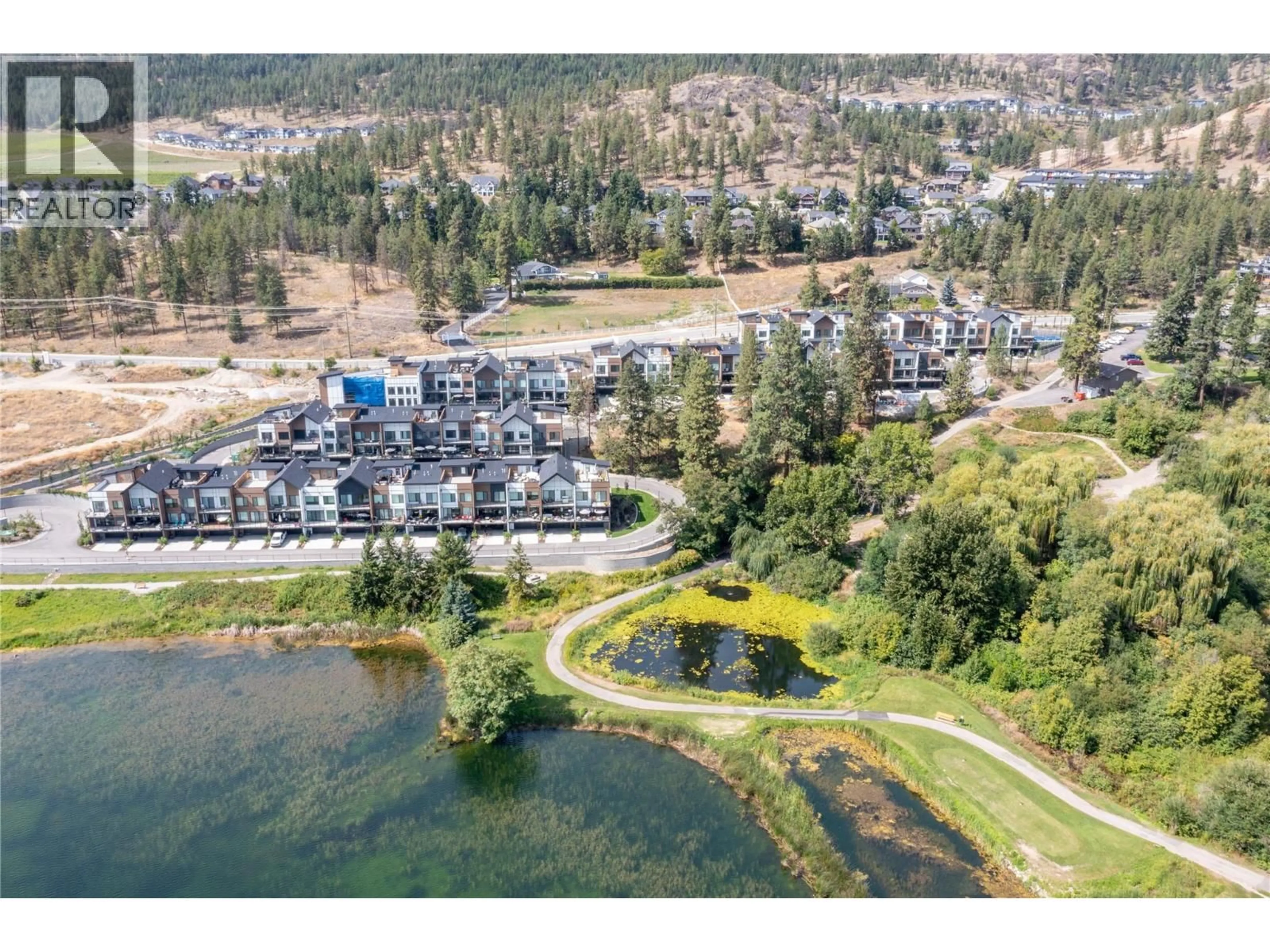 A pic from outside/outdoor area/front of a property/back of a property/a pic from drone, water/lake/river/ocean view for 411 - 2735 SHANNON LAKE ROAD, West Kelowna British Columbia V4T1V6