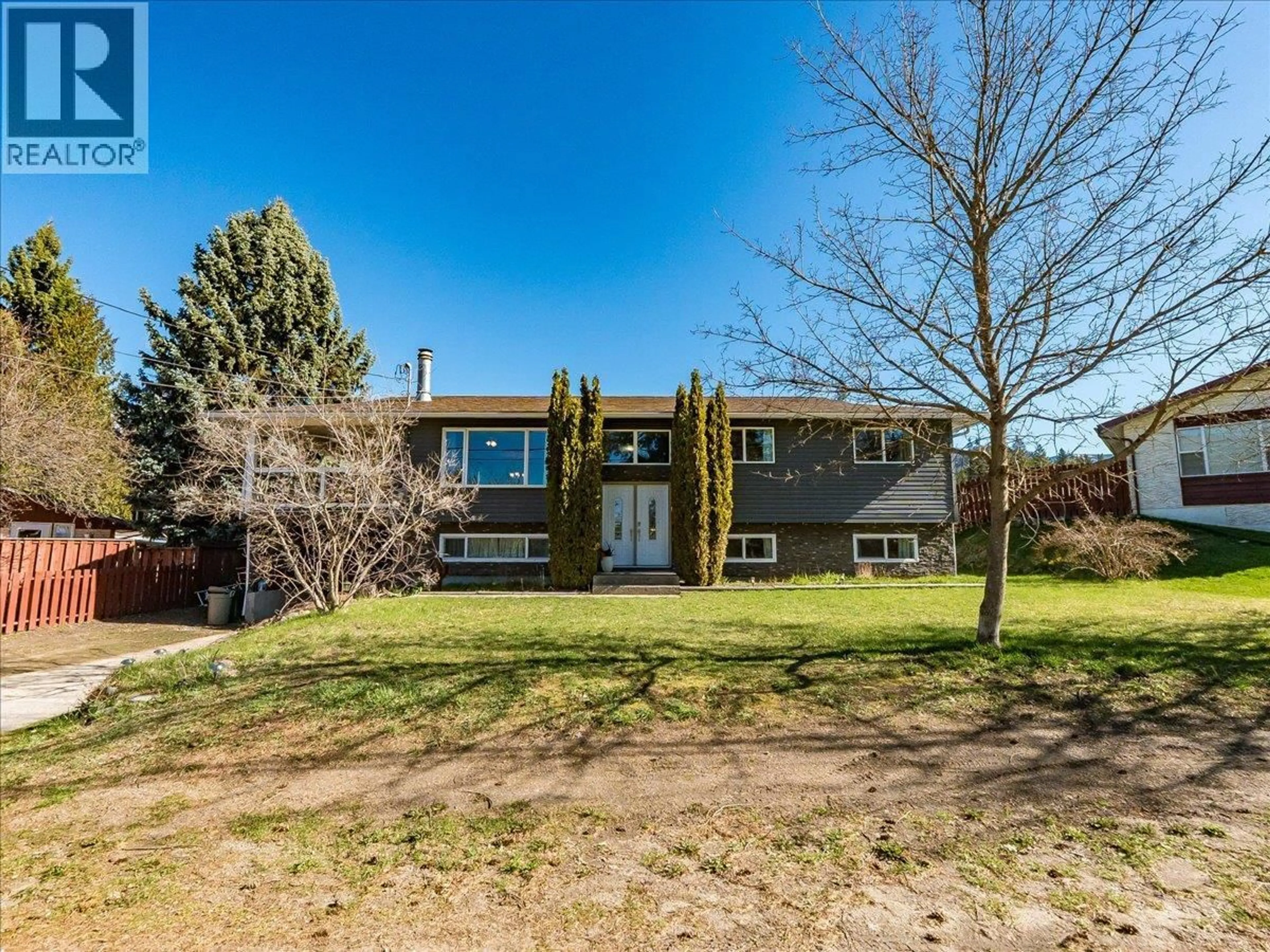 A pic from outside/outdoor area/front of a property/back of a property/a pic from drone, street for 86 BLUEBIRD ROAD, Fruitvale British Columbia V0G1L1