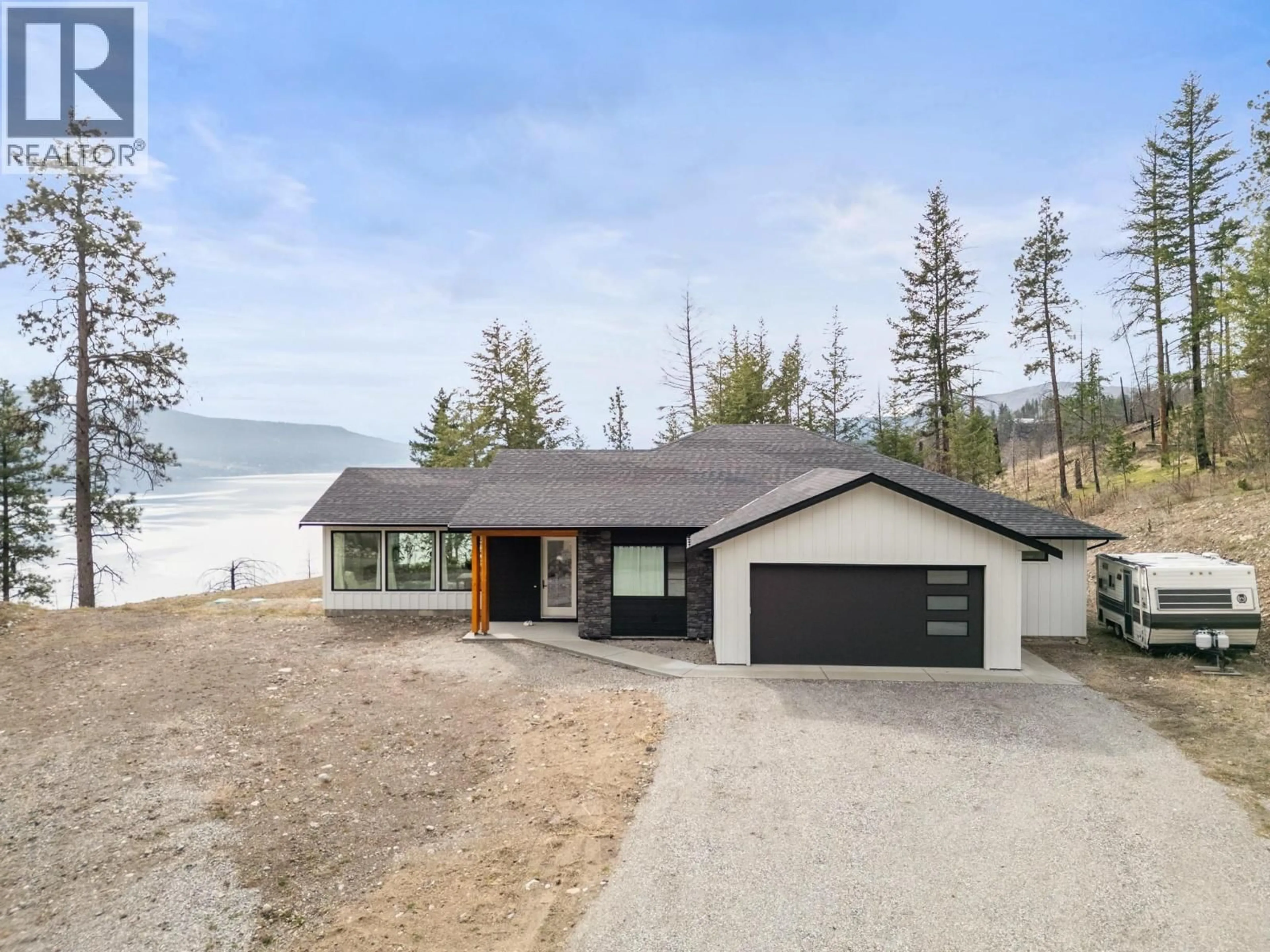 A pic from outside/outdoor area/front of a property/back of a property/a pic from drone, water/lake/river/ocean view for 91 LESTER ROAD, Vernon British Columbia V1H2G3