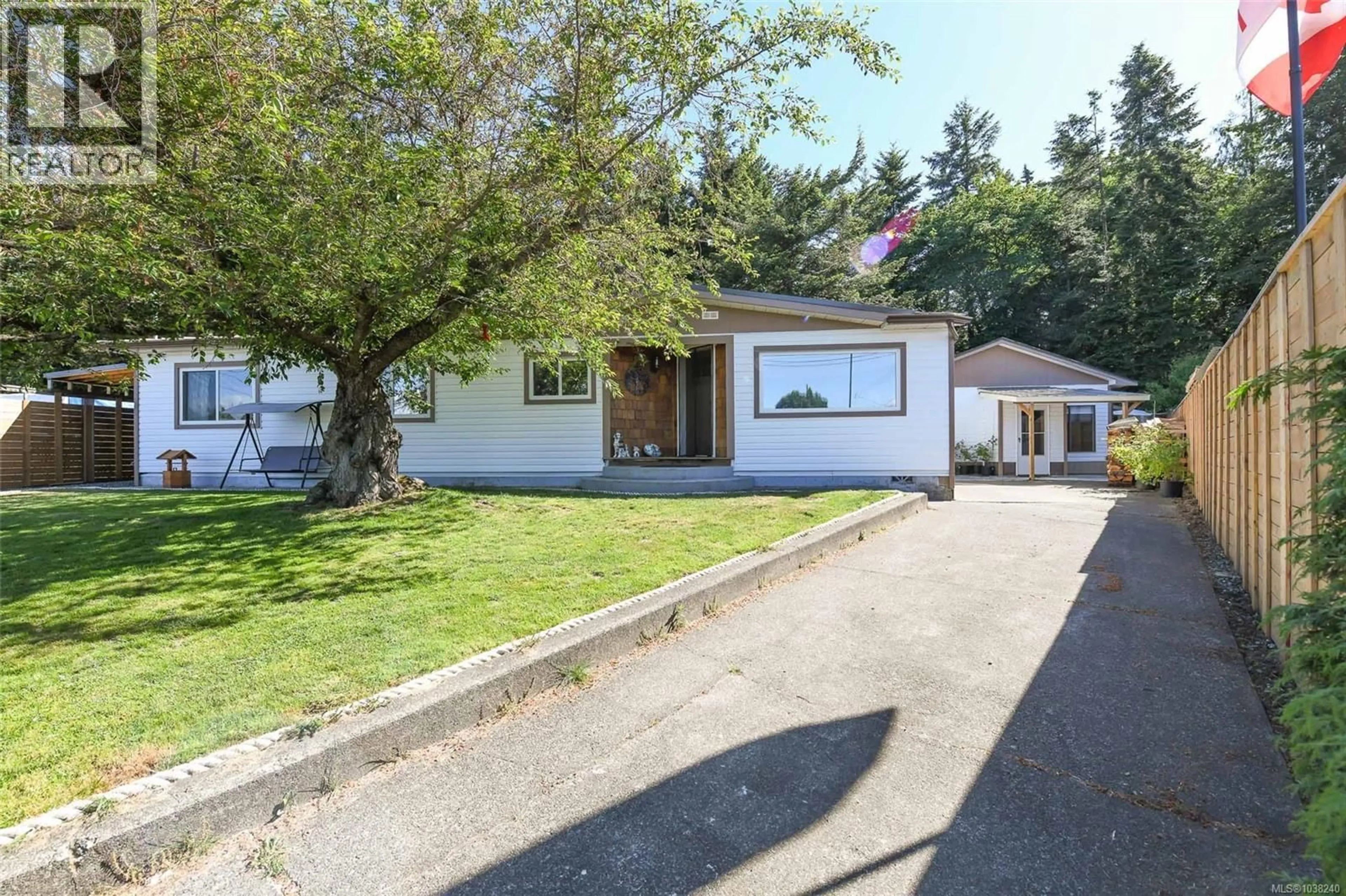 A pic from outside/outdoor area/front of a property/back of a property/a pic from drone, street for 610 NECHAKO AVENUE, Courtenay British Columbia V9N7R3