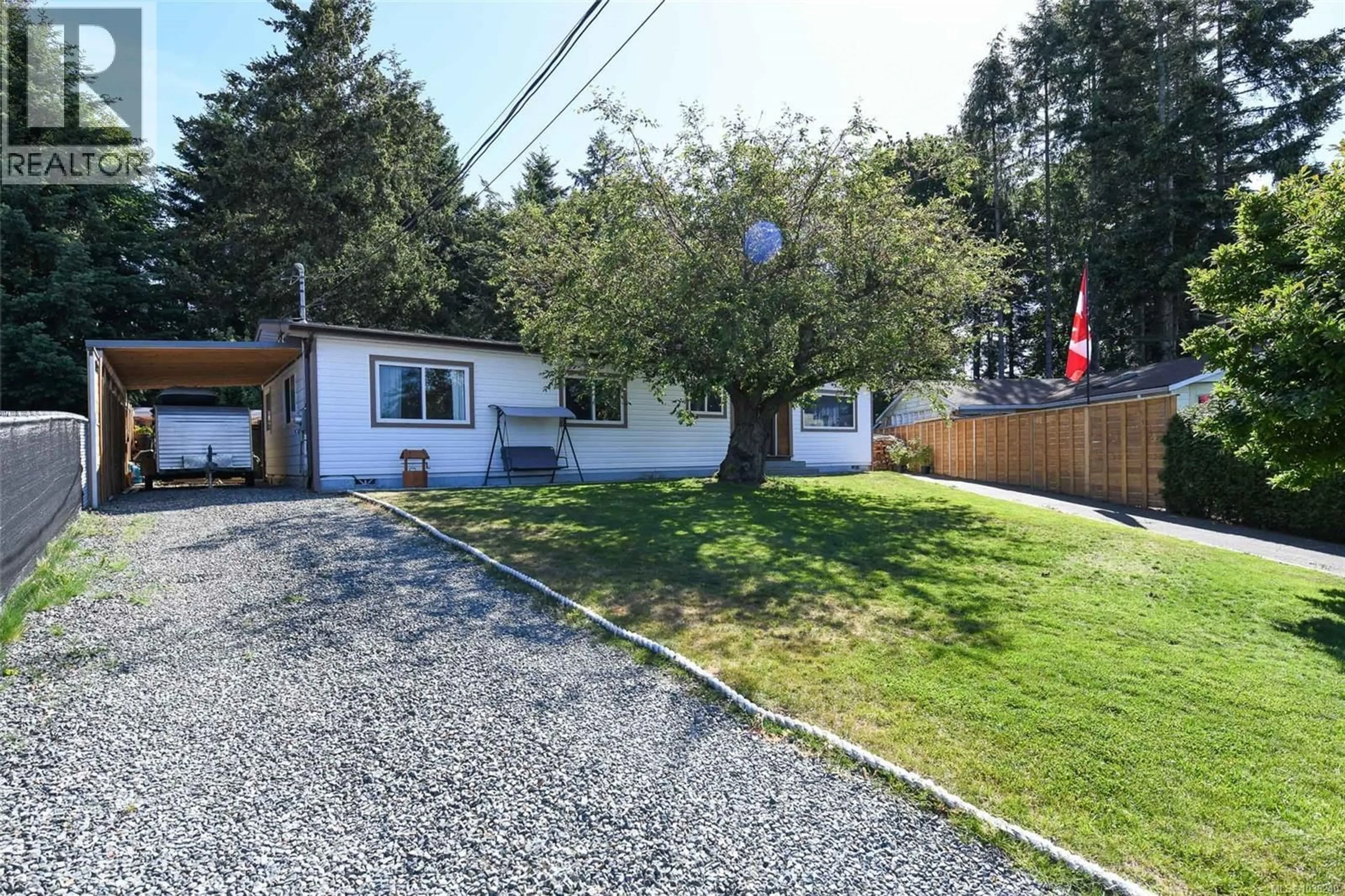 A pic from outside/outdoor area/front of a property/back of a property/a pic from drone, street for 610 NECHAKO AVENUE, Courtenay British Columbia V9N7R3