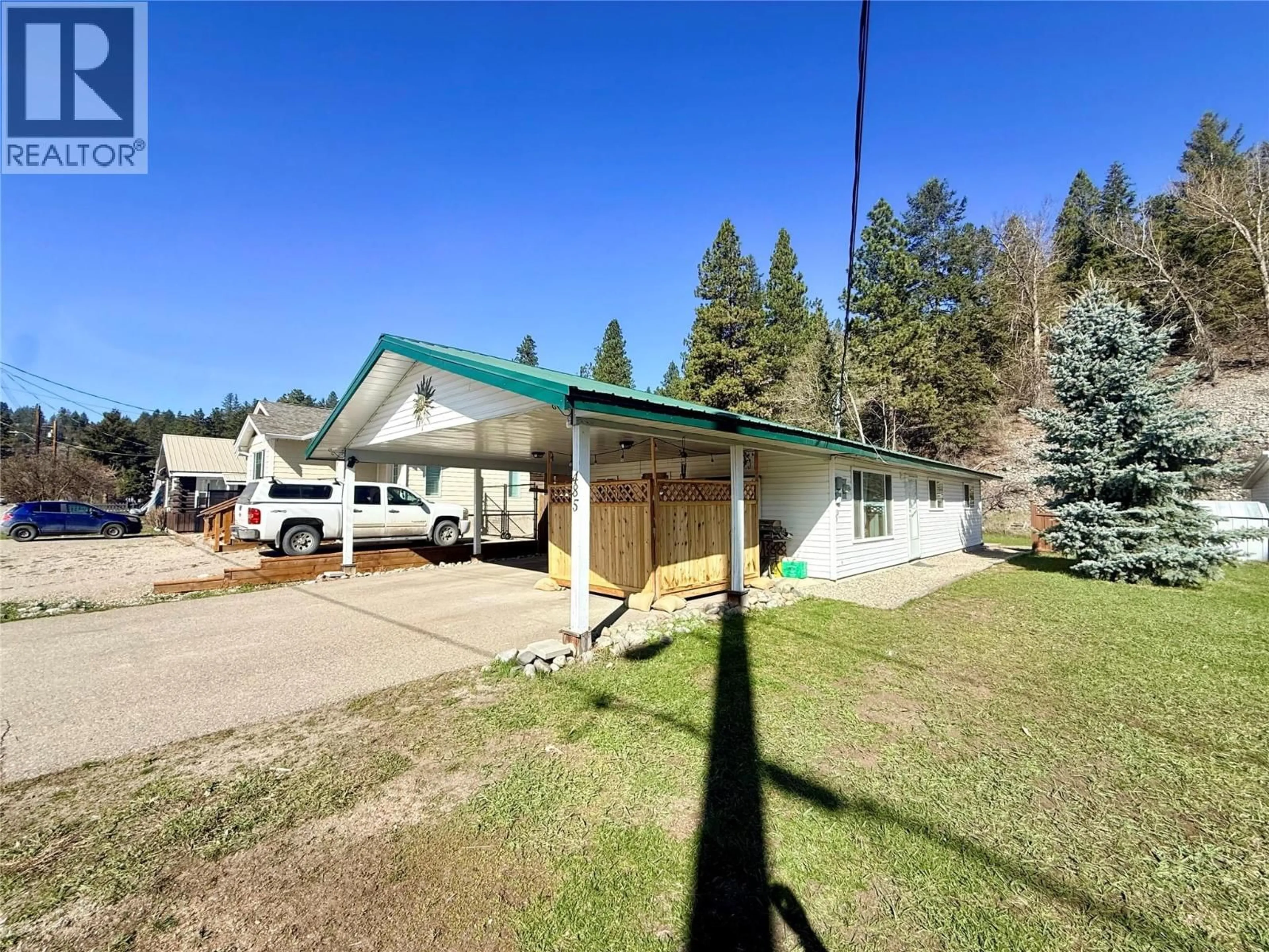 A pic from outside/outdoor area/front of a property/back of a property/a pic from drone, mountain view for 485 AUBURN CRESCENT, Princeton British Columbia V0X1W0