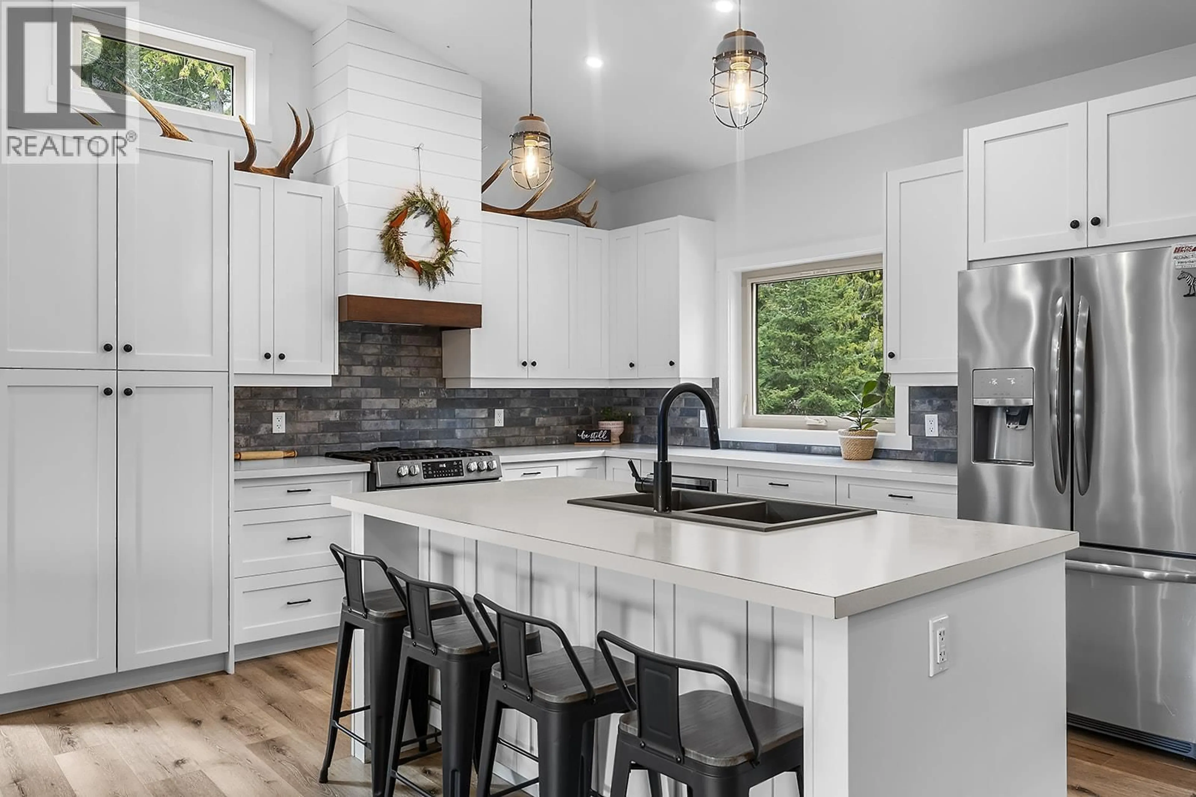 Open concept kitchen, ceramic/tile floor for 1562 TEETZEL ROAD, Creston British Columbia V0B1G7