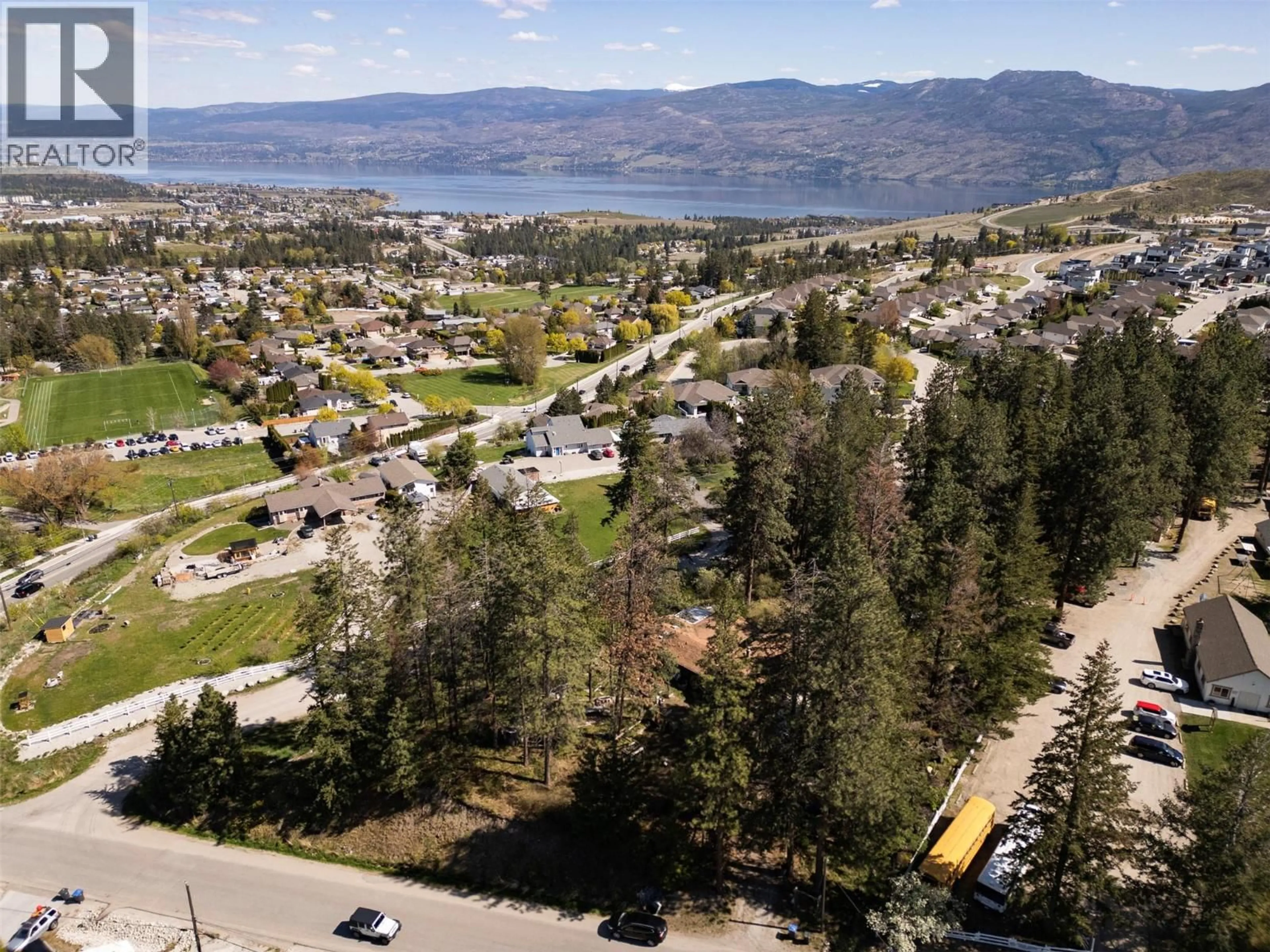 A pic from outside/outdoor area/front of a property/back of a property/a pic from drone, mountain view for 3021 MCIVER ROAD, West Kelowna British Columbia V4T1C4