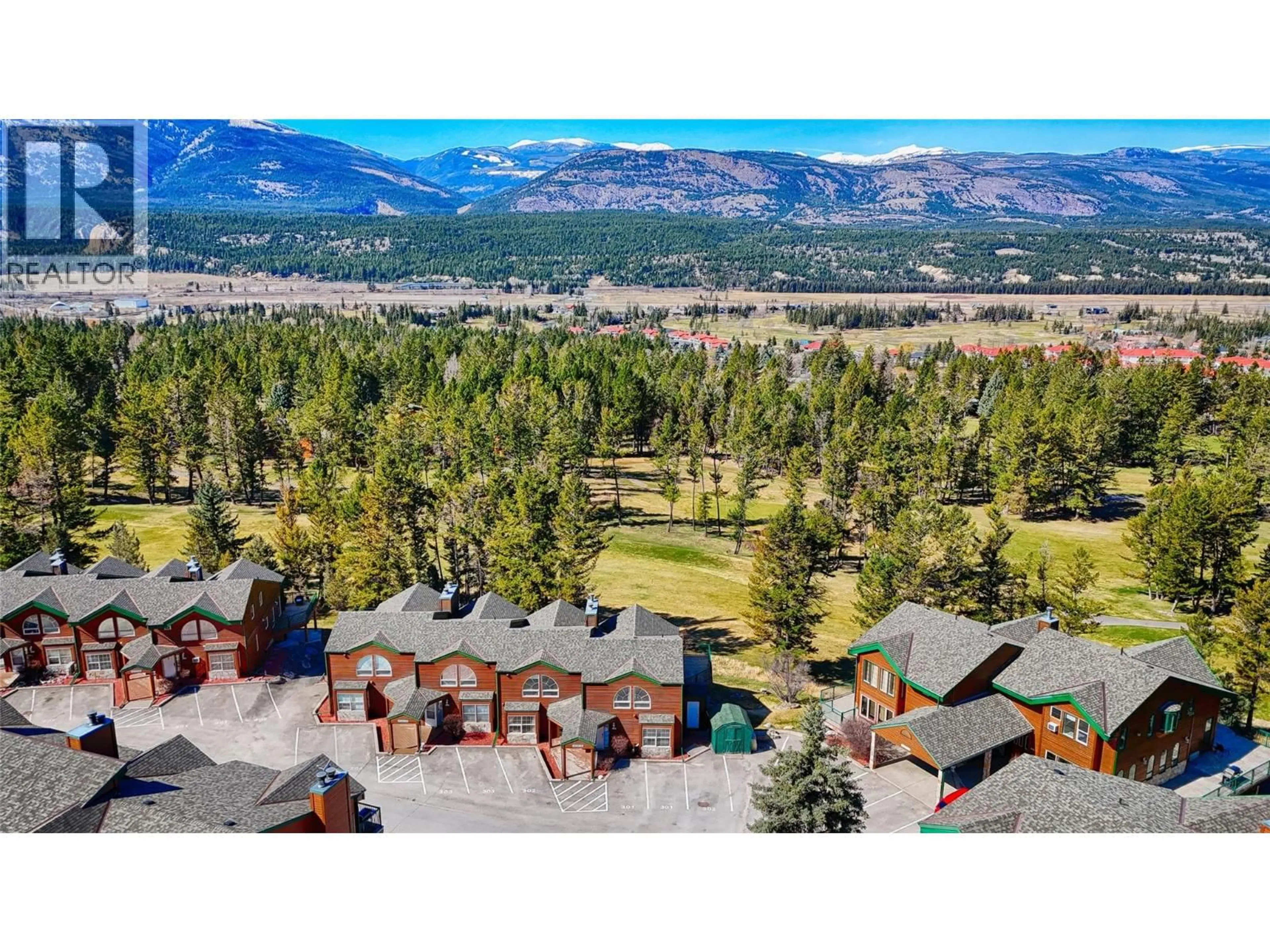 A pic from outside/outdoor area/front of a property/back of a property/a pic from drone, mountain view for 301 - 5155 FAIRWAY DRIVE, Fairmont Hot Springs British Columbia V0B1L0