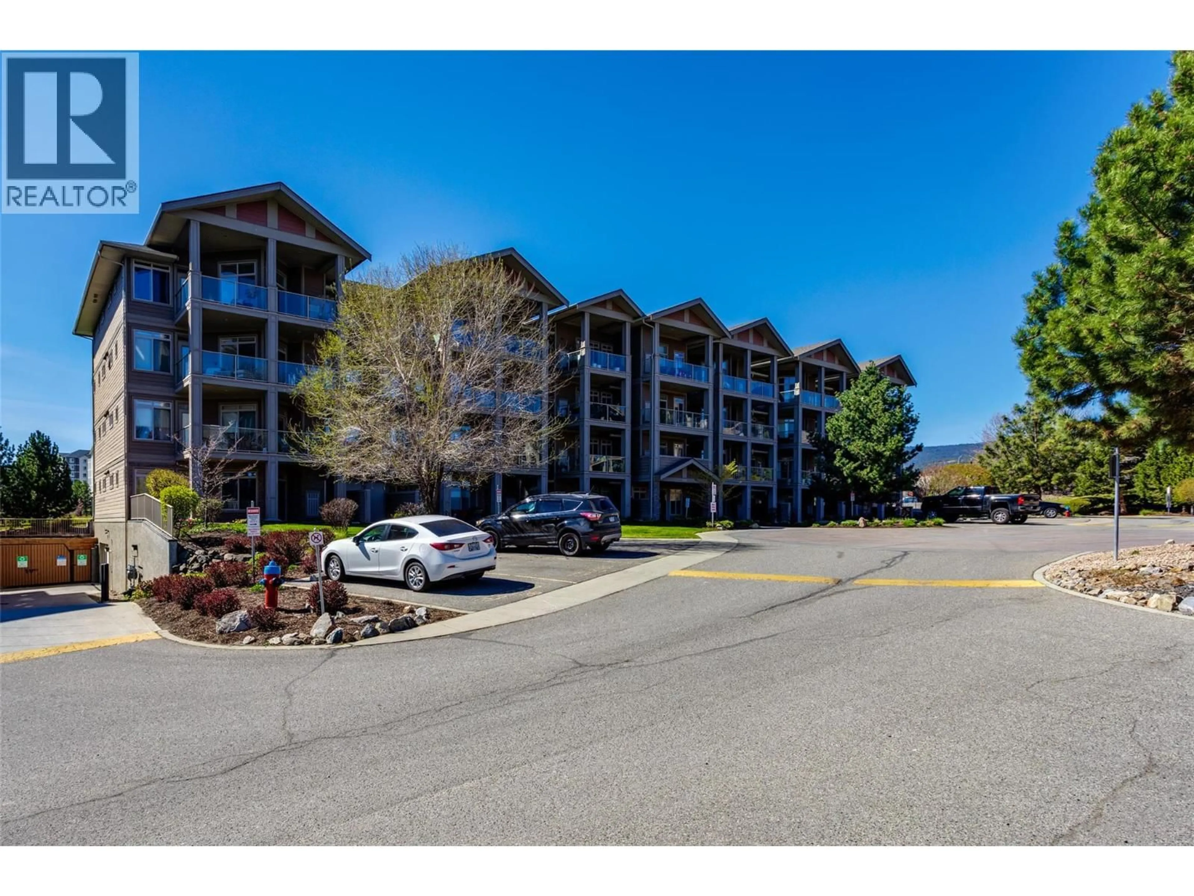 A pic from outside/outdoor area/front of a property/back of a property/a pic from drone, mountain view for 301 - 3533 CARRINGTON ROAD, Westbank British Columbia V4T2Z9