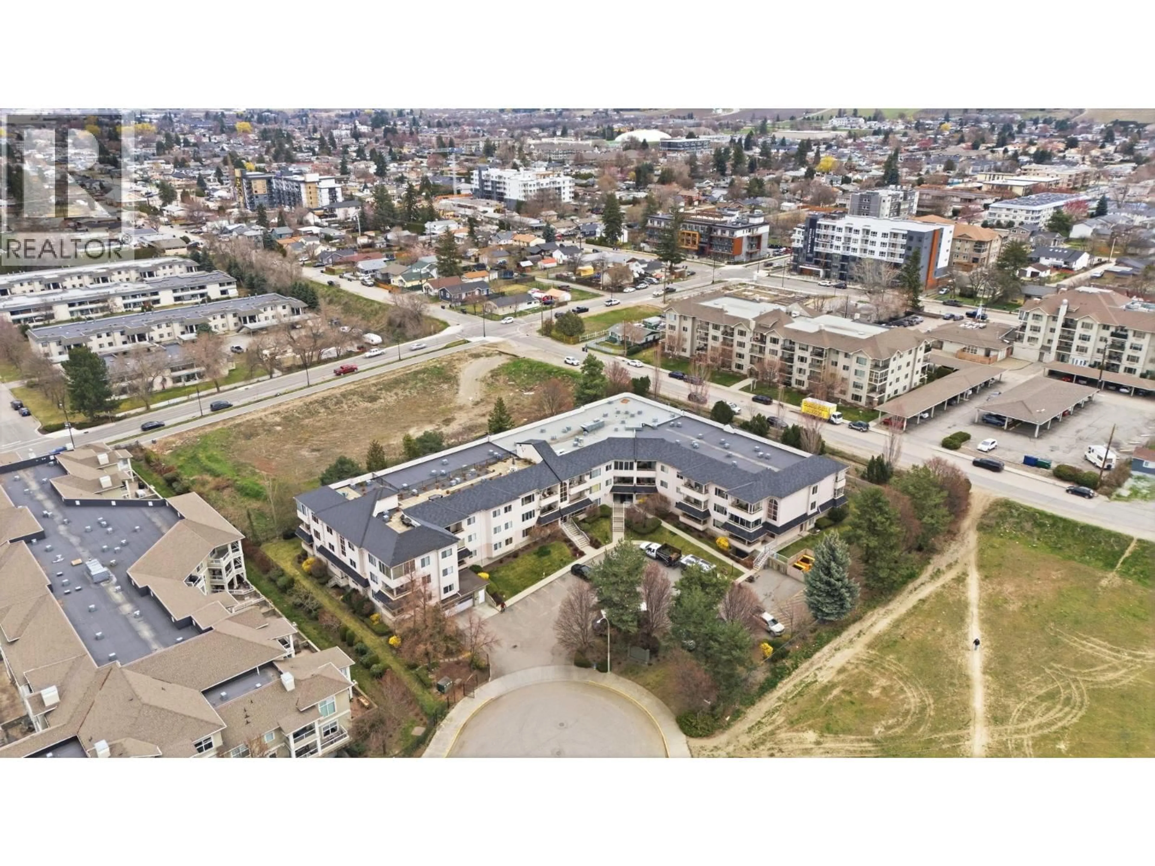 A pic from outside/outdoor area/front of a property/back of a property/a pic from drone, unknown for 103 - 255 AURORA CRESCENT, Rutland British Columbia V1X7L8