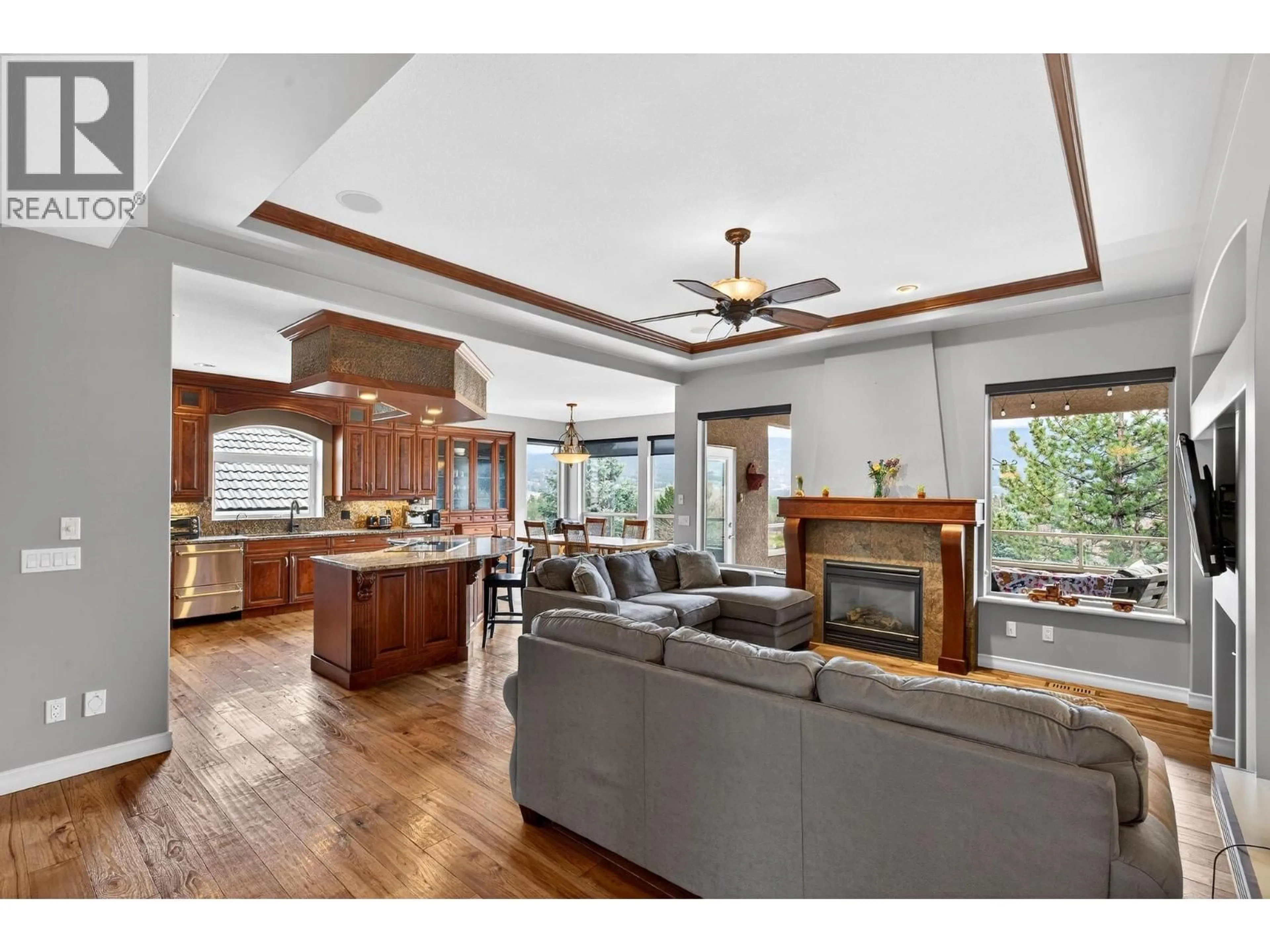 Open concept kitchen, wood/laminate floor for 2288 CAPISTRANO DRIVE, Kelowna British Columbia V1V2A2