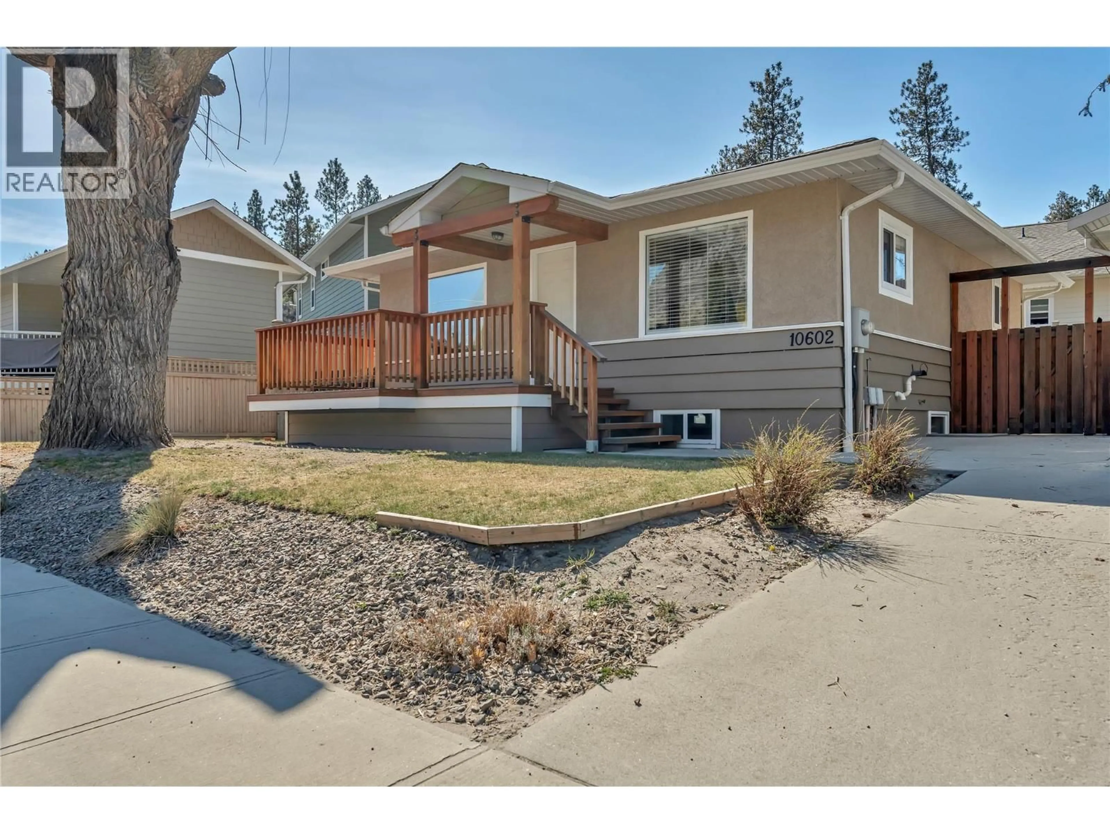 Home with vinyl exterior material, street for 10602 VICTORIA ROAD SOUTH, Summerland British Columbia V0H1Z2