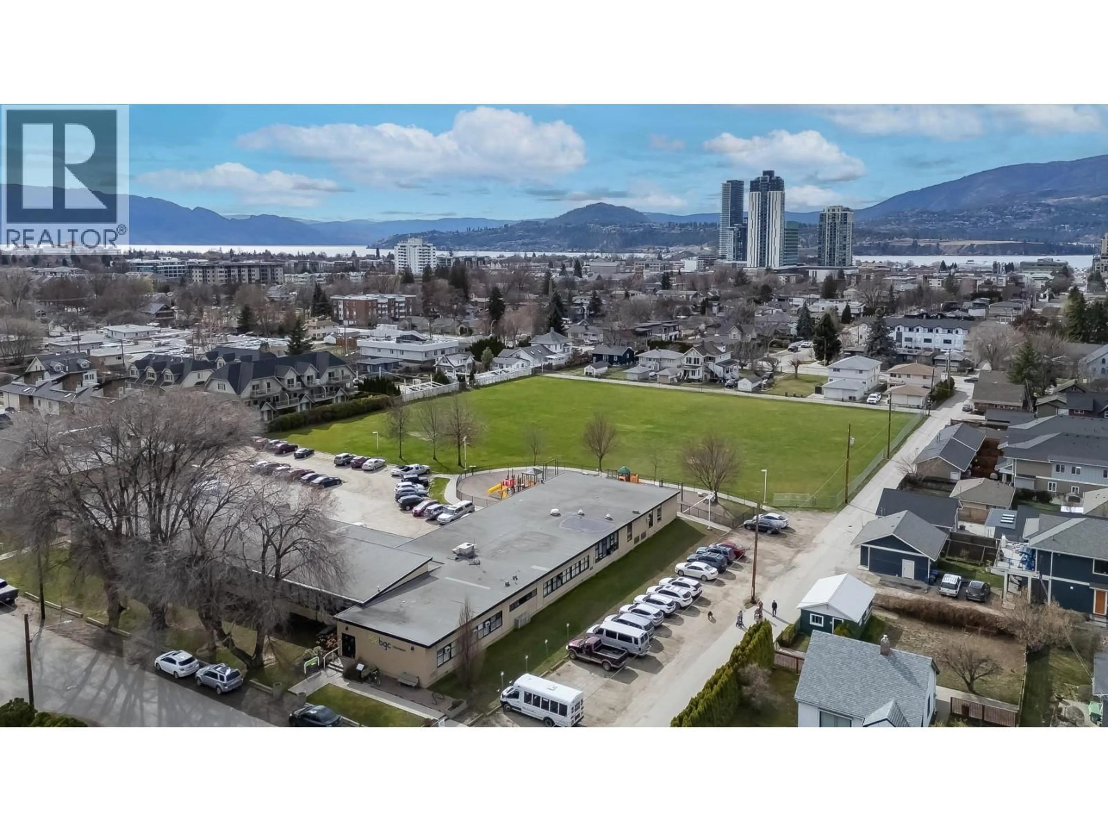 A pic from outside/outdoor area/front of a property/back of a property/a pic from drone, mountain view for 951 STOCKWELL AVENUE, Kelowna British Columbia V1Y6W3