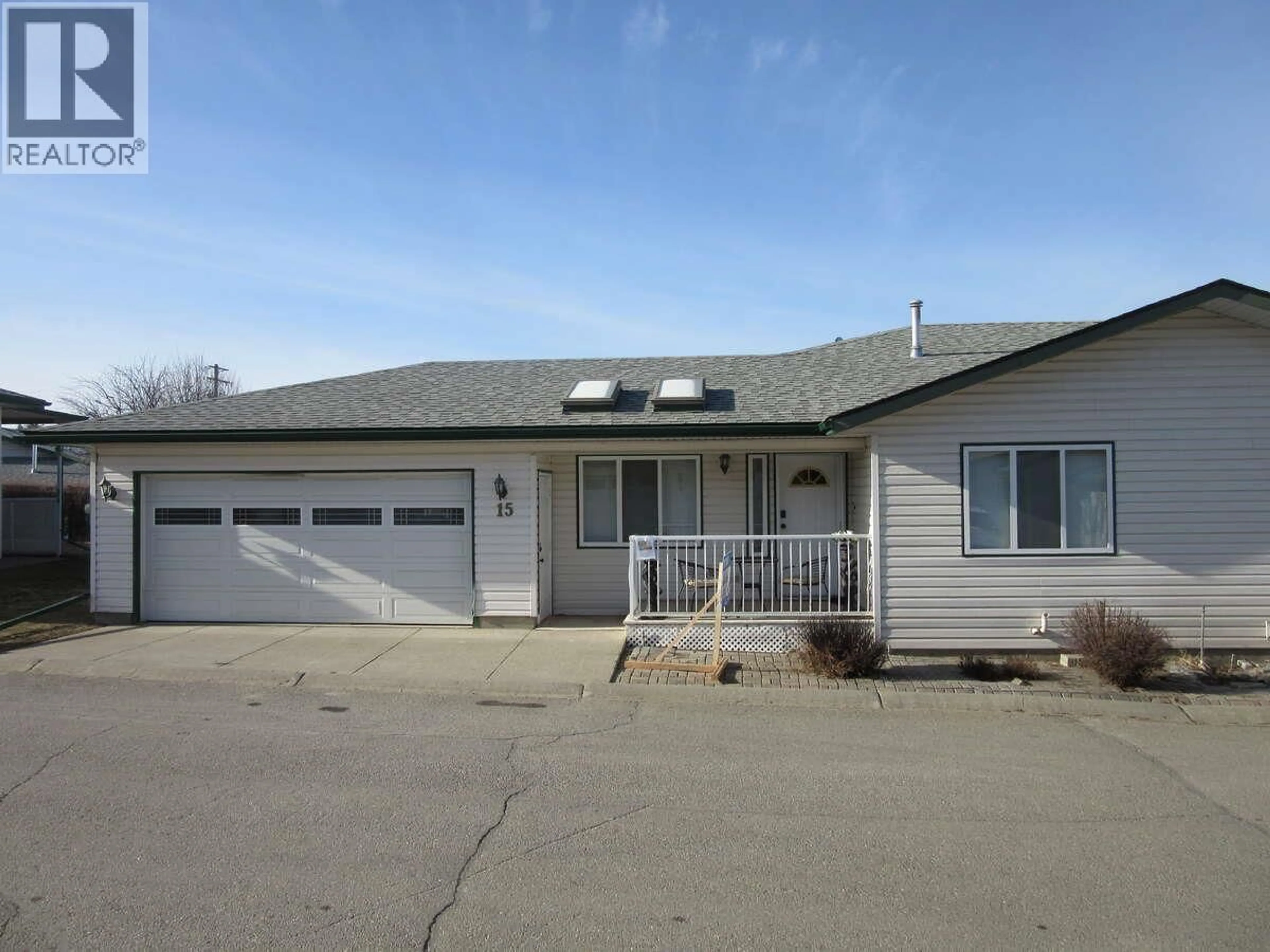 Home with vinyl exterior material, street for 15 - 2375 1ST STREET, Cranbrook British Columbia V1C6J7