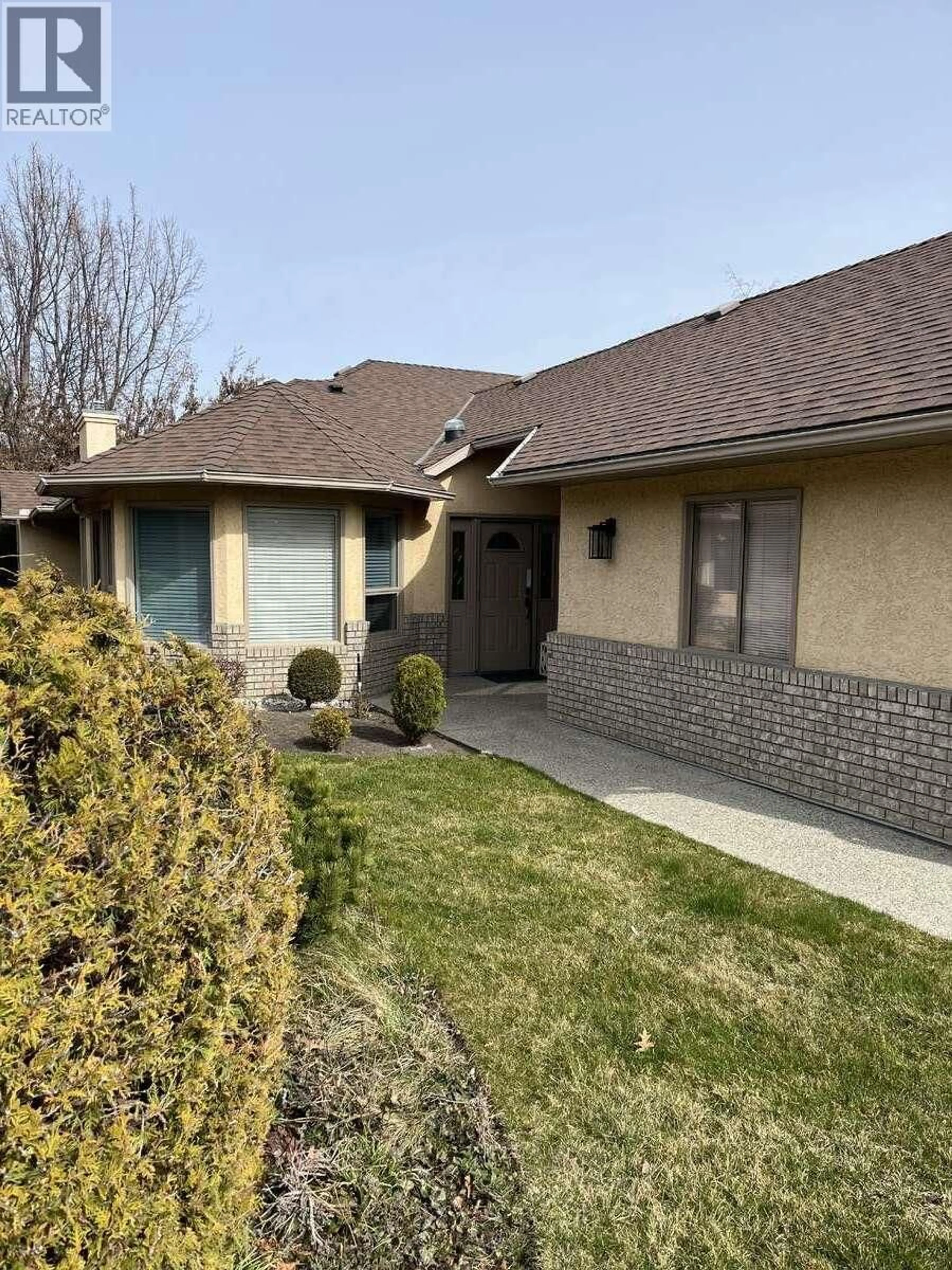 Home with brick exterior material, street for 11 - 860 LANFRANCO ROAD, Kelowna British Columbia V1W3W9