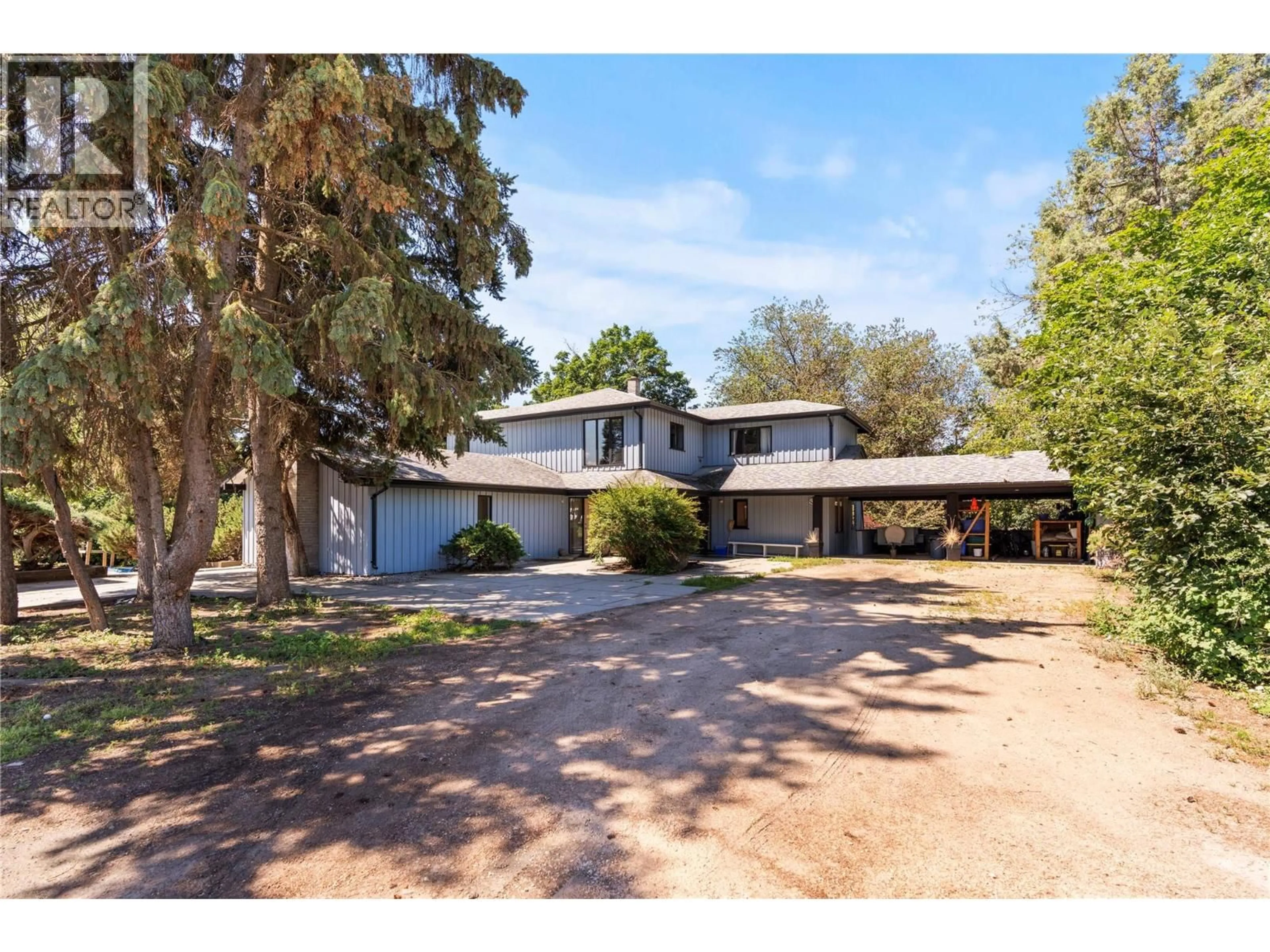 A pic from outside/outdoor area/front of a property/back of a property/a pic from drone, street for 1451 MOUNTVIEW ROAD, Vernon British Columbia V1B3A5