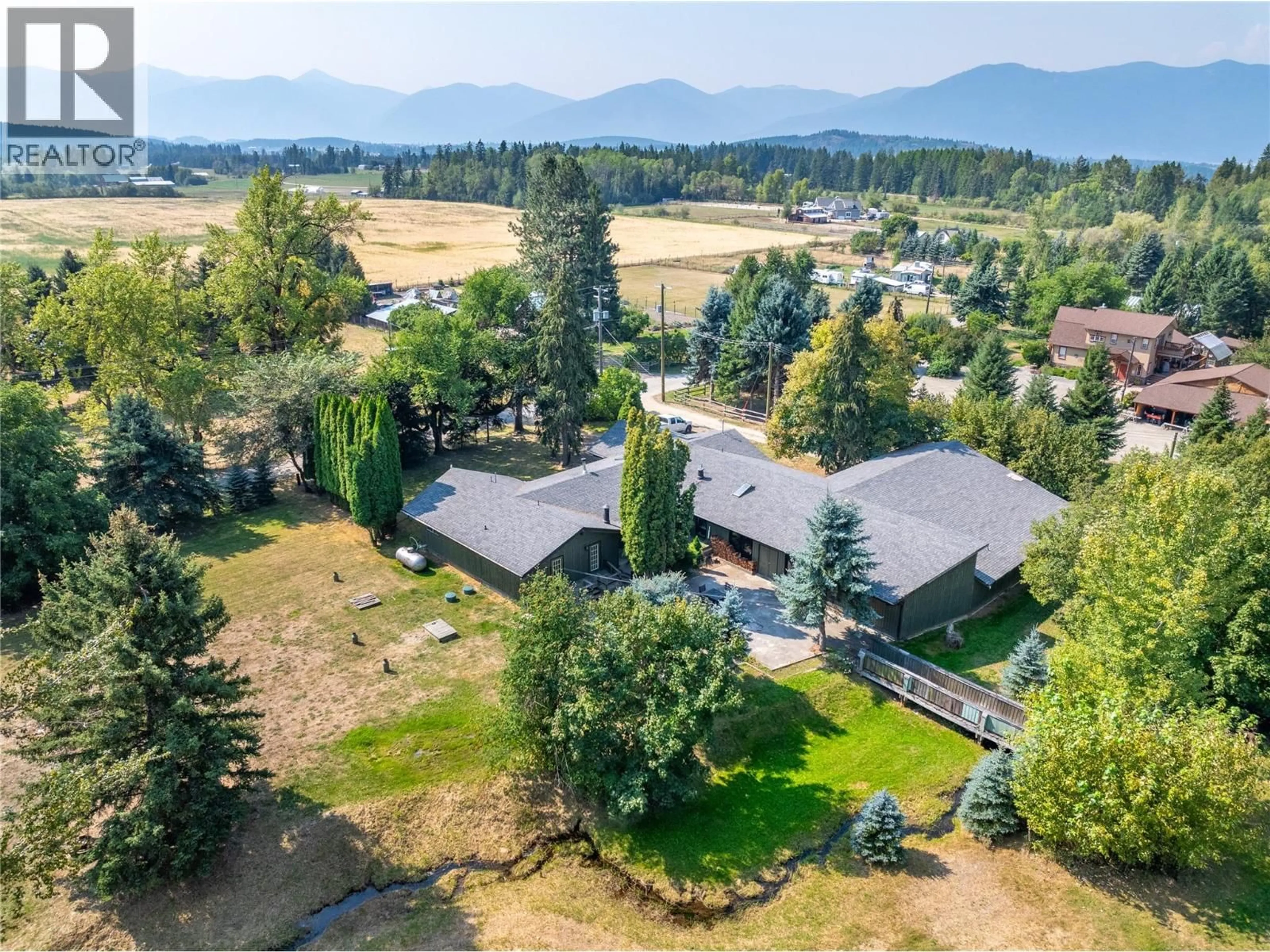 A pic from outside/outdoor area/front of a property/back of a property/a pic from drone, mountain view for 4580 44TH STREET, Canyon British Columbia V0B1C1