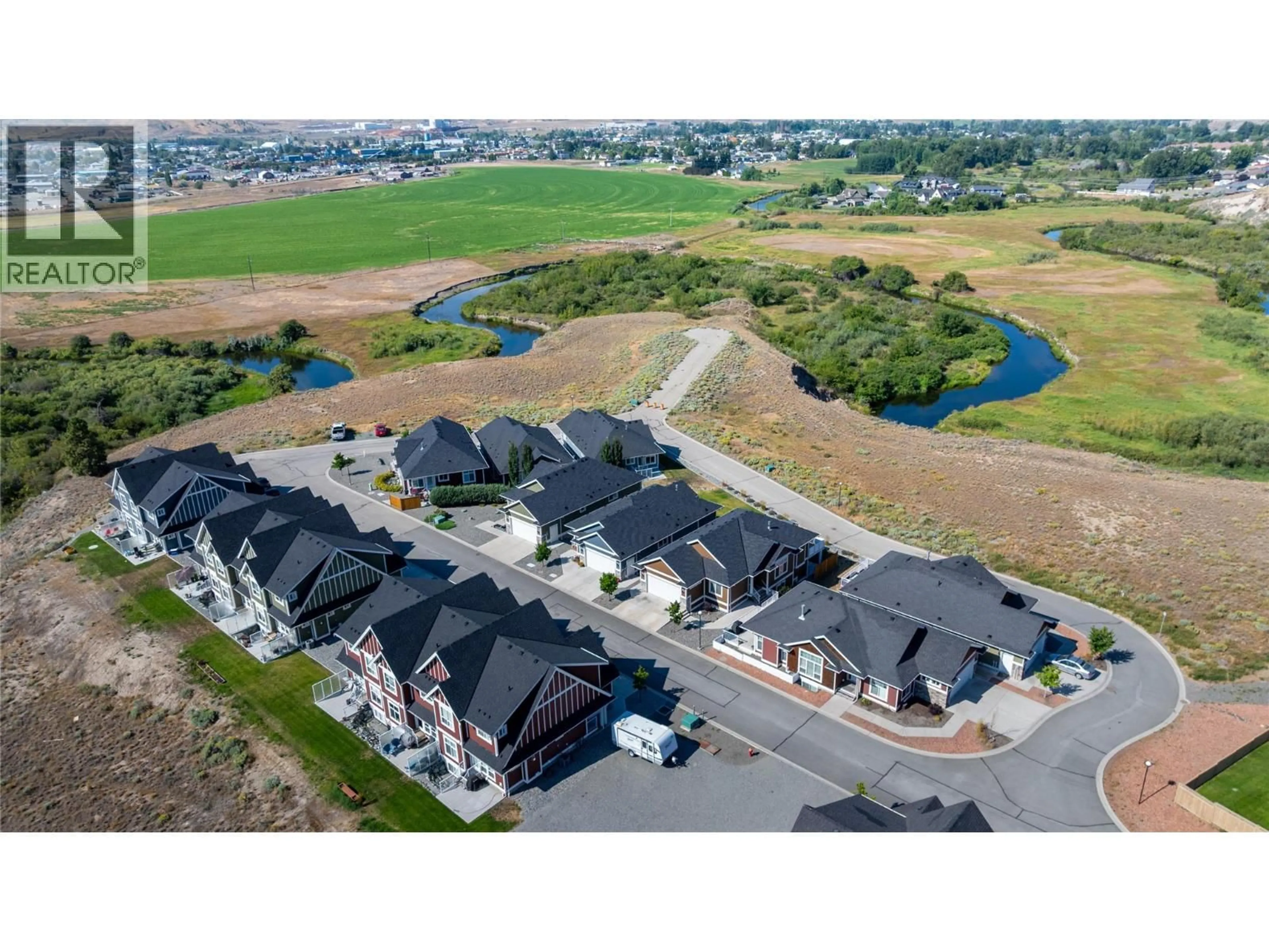 A pic from outside/outdoor area/front of a property/back of a property/a pic from drone, unknown for 103 - 2514 SPRING BANK AVENUE, Merritt British Columbia V1K0B1