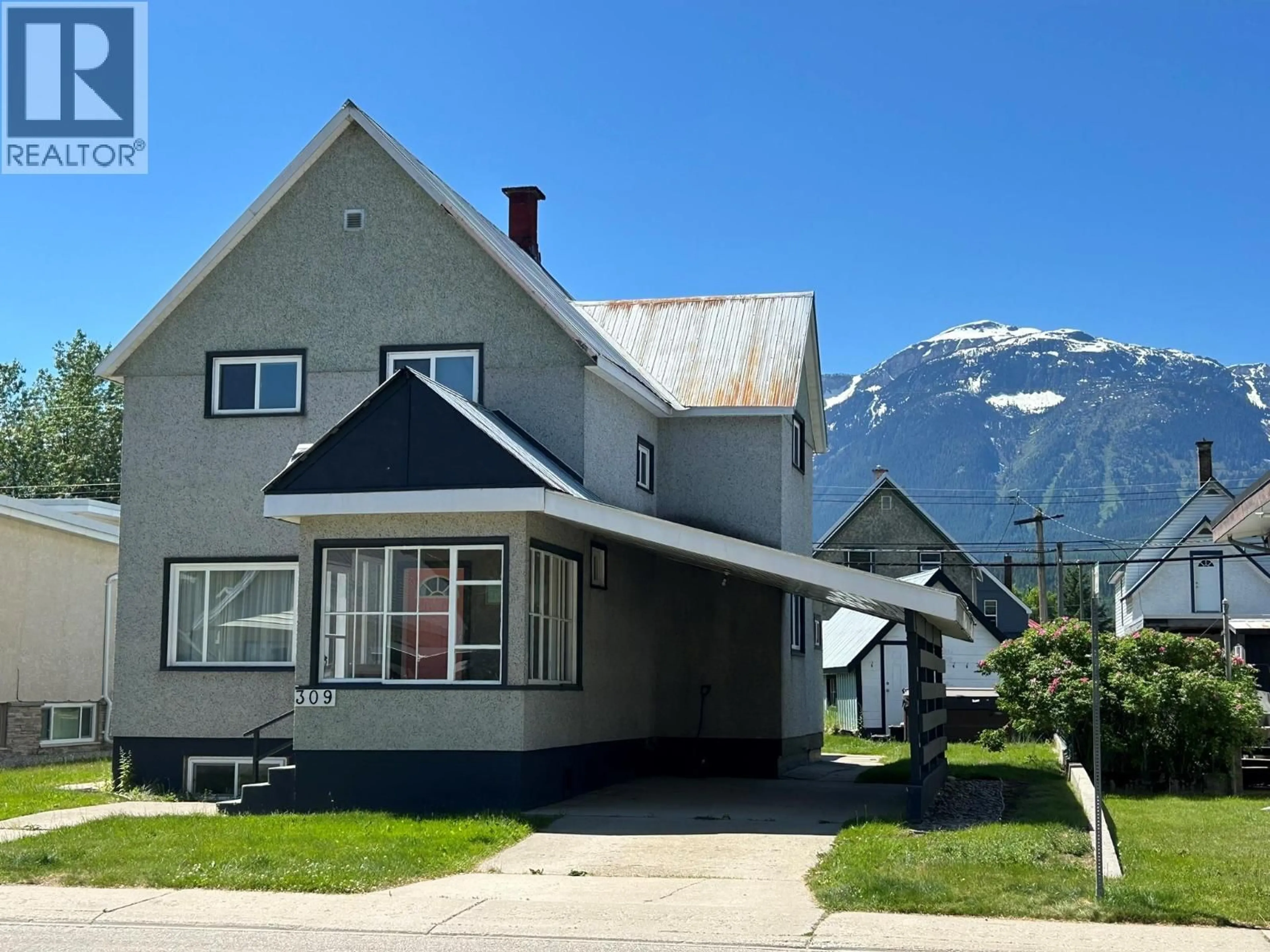 A pic from outside/outdoor area/front of a property/back of a property/a pic from drone, mountain view for 309 THIRD STREET EAST, Revelstoke British Columbia V0E2S0