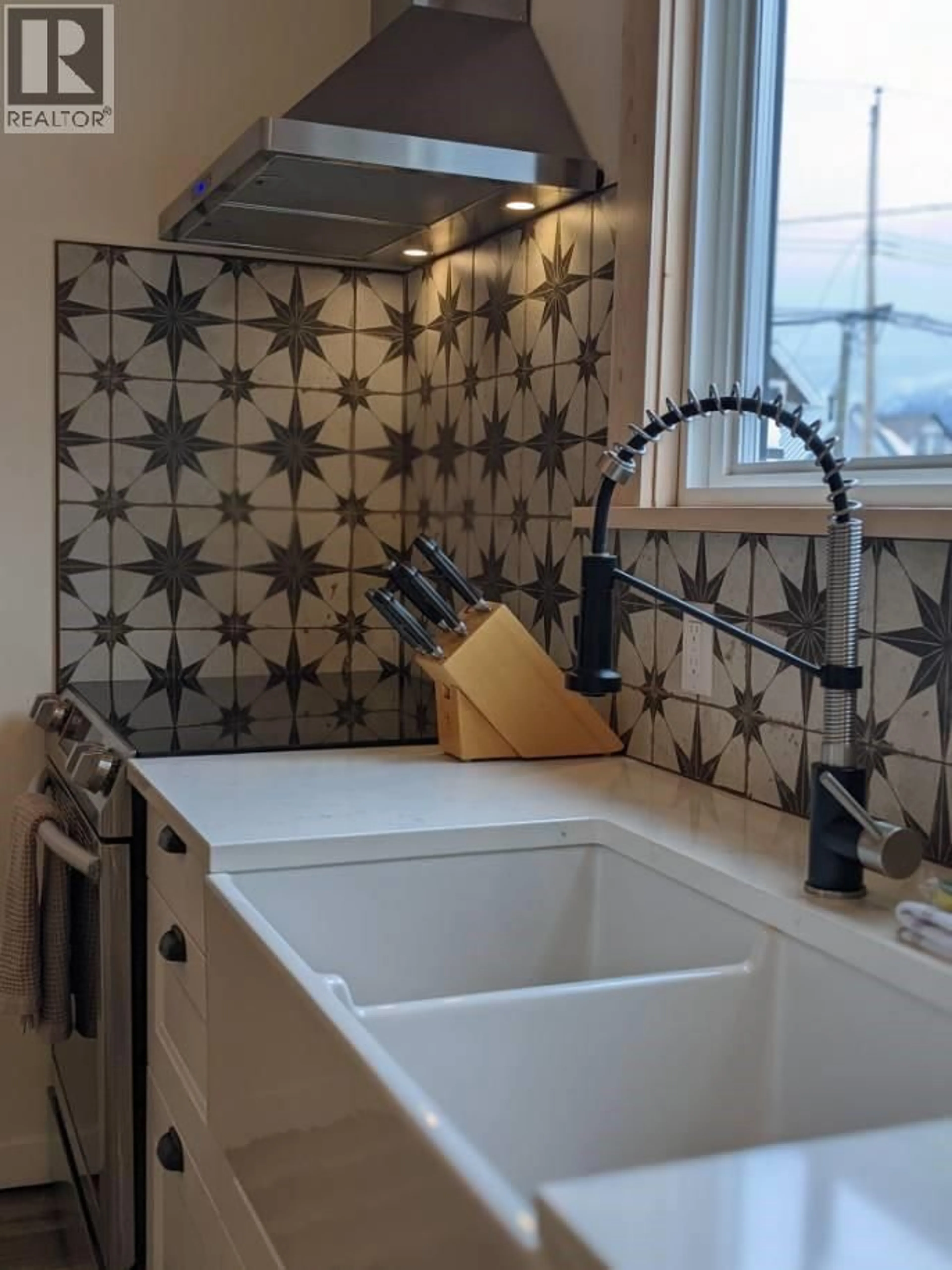 Contemporary kitchen, ceramic/tile floor for 309 THIRD STREET EAST, Revelstoke British Columbia V0E2S0