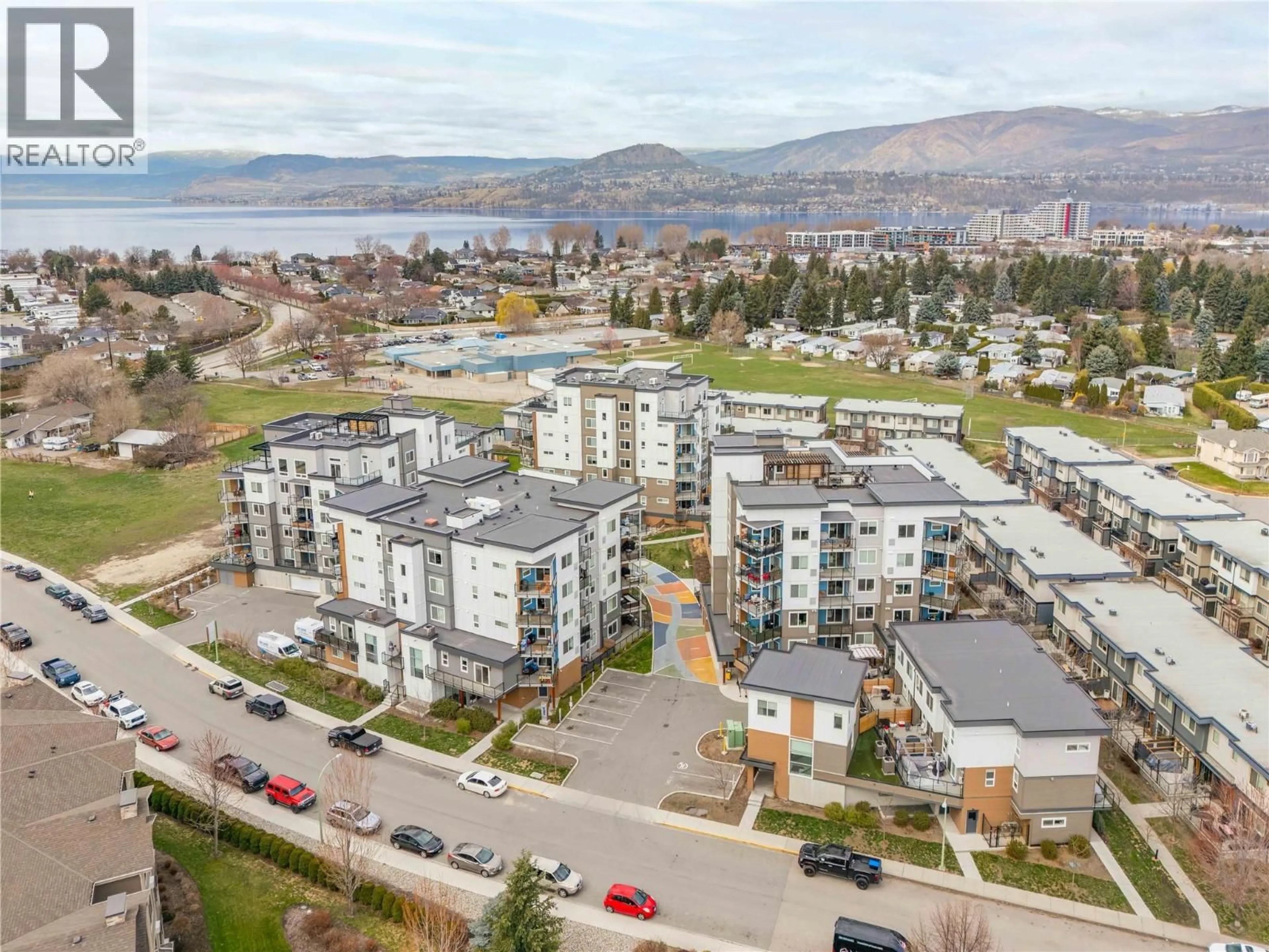 A pic from outside/outdoor area/front of a property/back of a property/a pic from drone, mountain view for 404 - 3634 MISSION SPRINGS DRIVE, Kelowna British Columbia V1W0C9