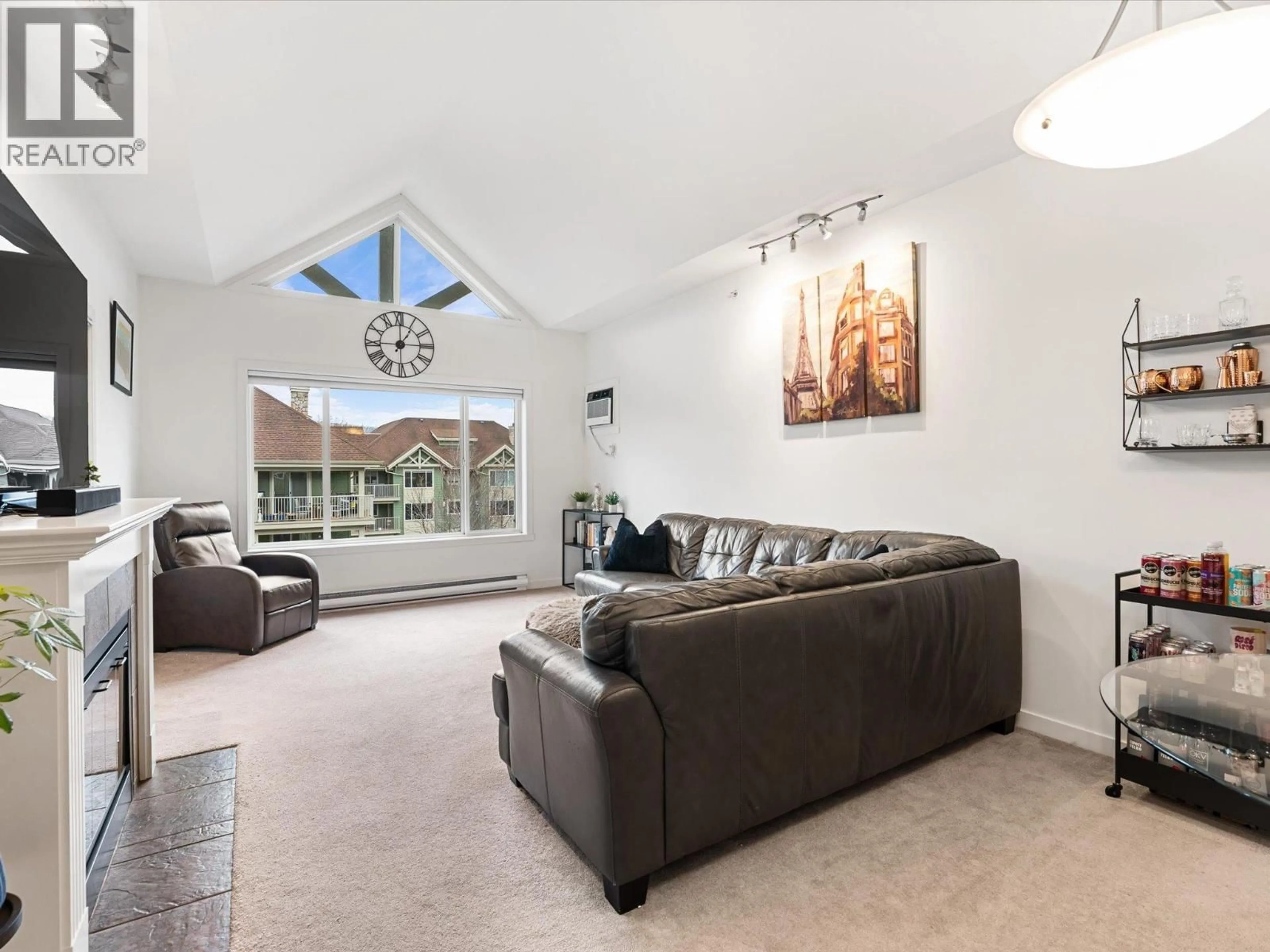 Living room with furniture, unknown for 404 - 688 LEQUIME ROAD, Kelowna British Columbia V1W1A3