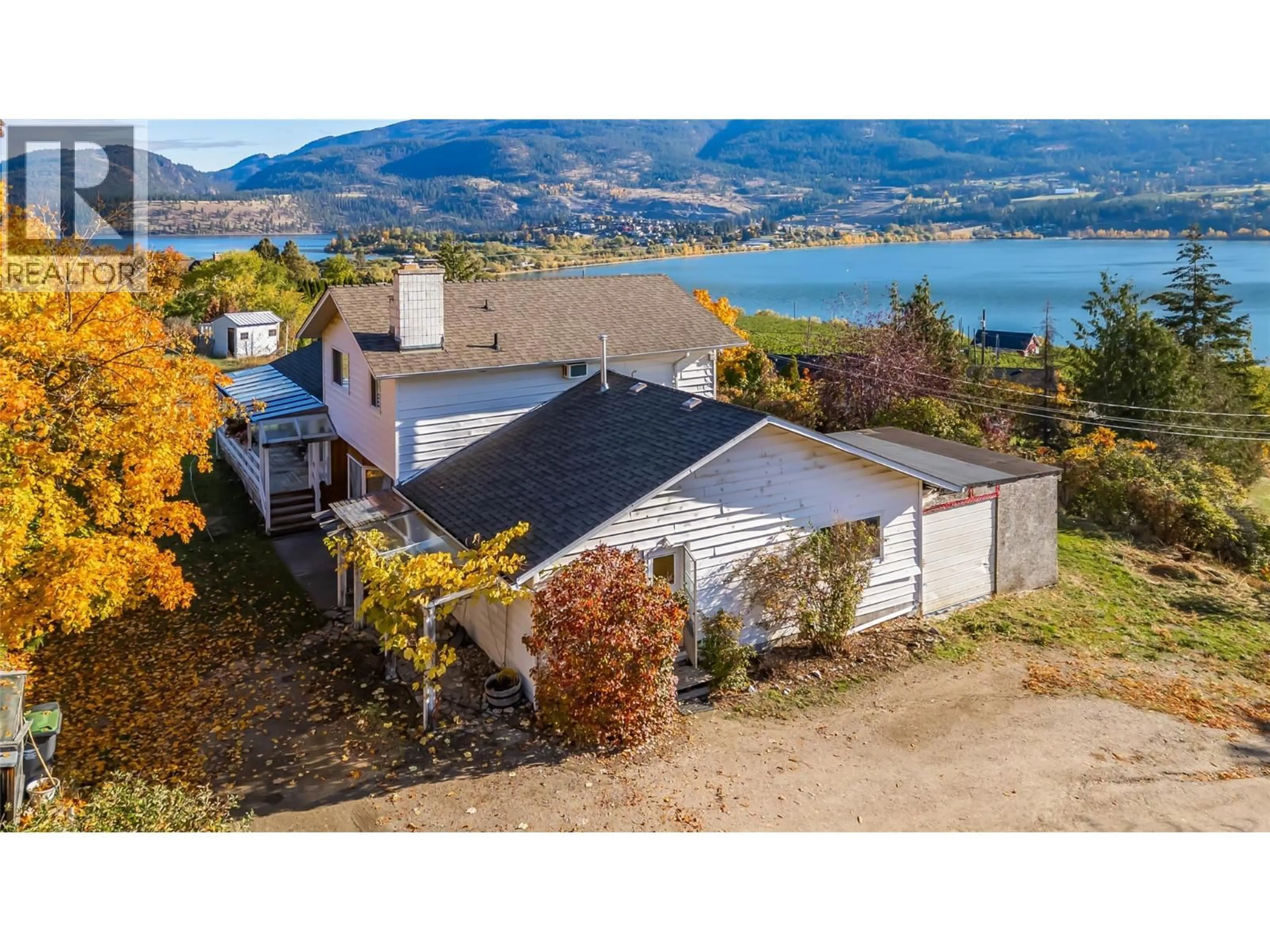 A pic from outside/outdoor area/front of a property/back of a property/a pic from drone, water/lake/river/ocean view for 15370 OLD MISSION ROAD, Lake Country British Columbia V4V2G5